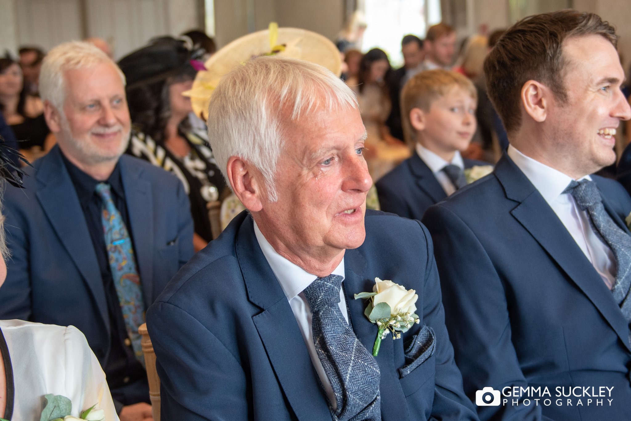 father of the groom crying during the wedding ceremony at the devonshire fell