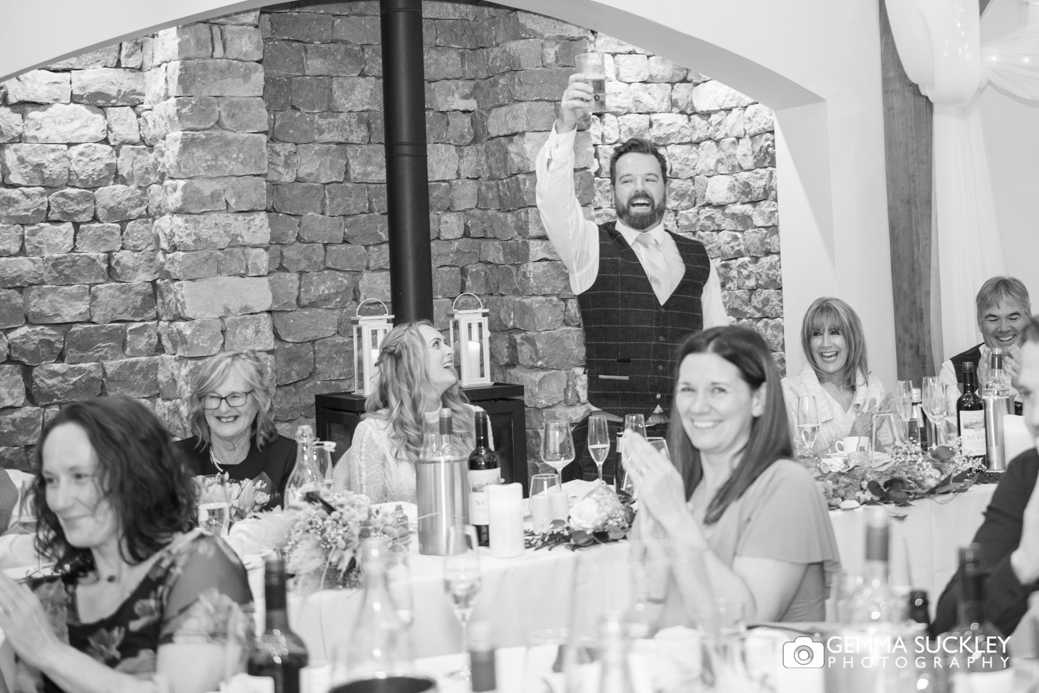 groom standing during wedding speeches at the gamekeepers inn