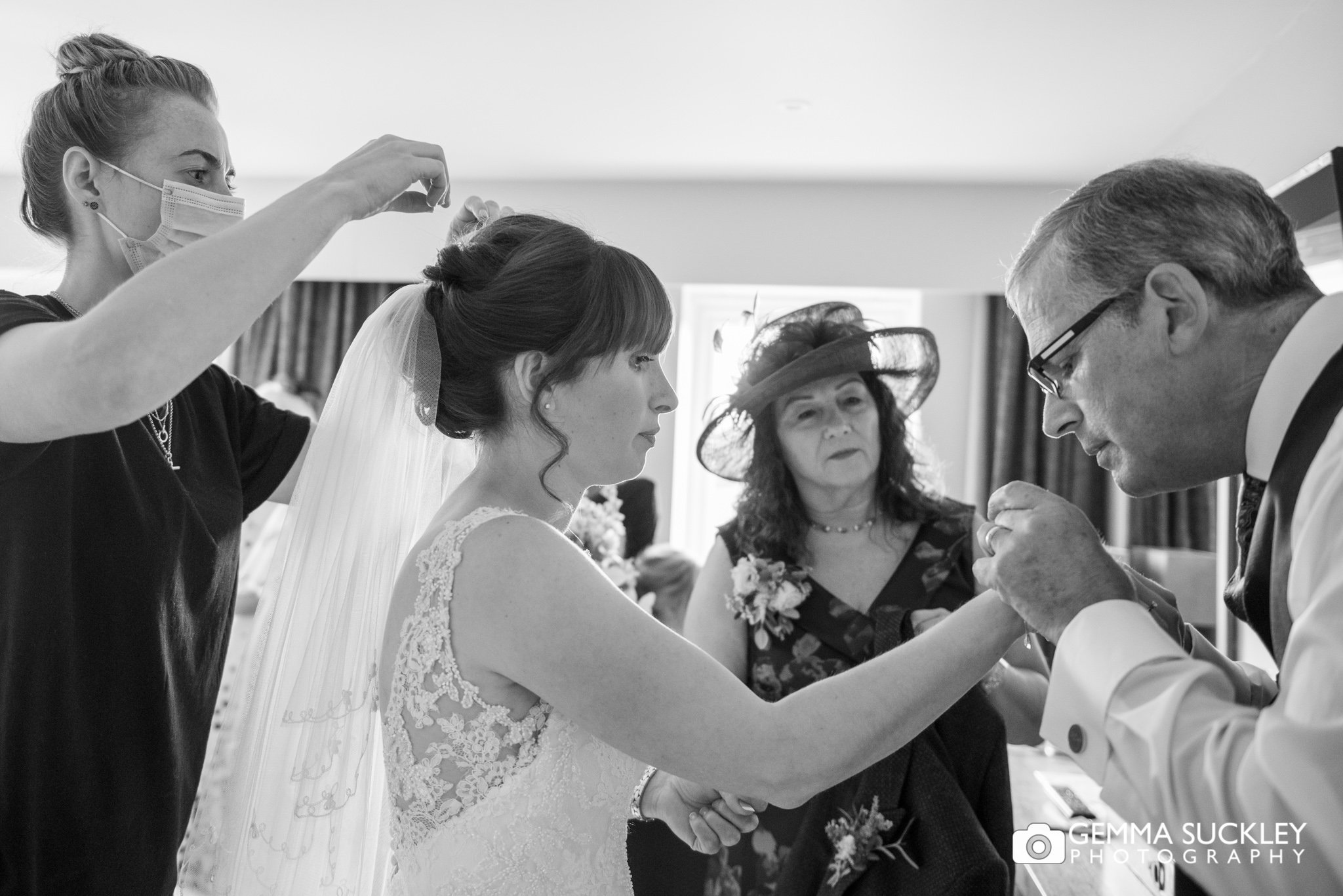 a busy scene of a bride getting ready at coniston hotel 