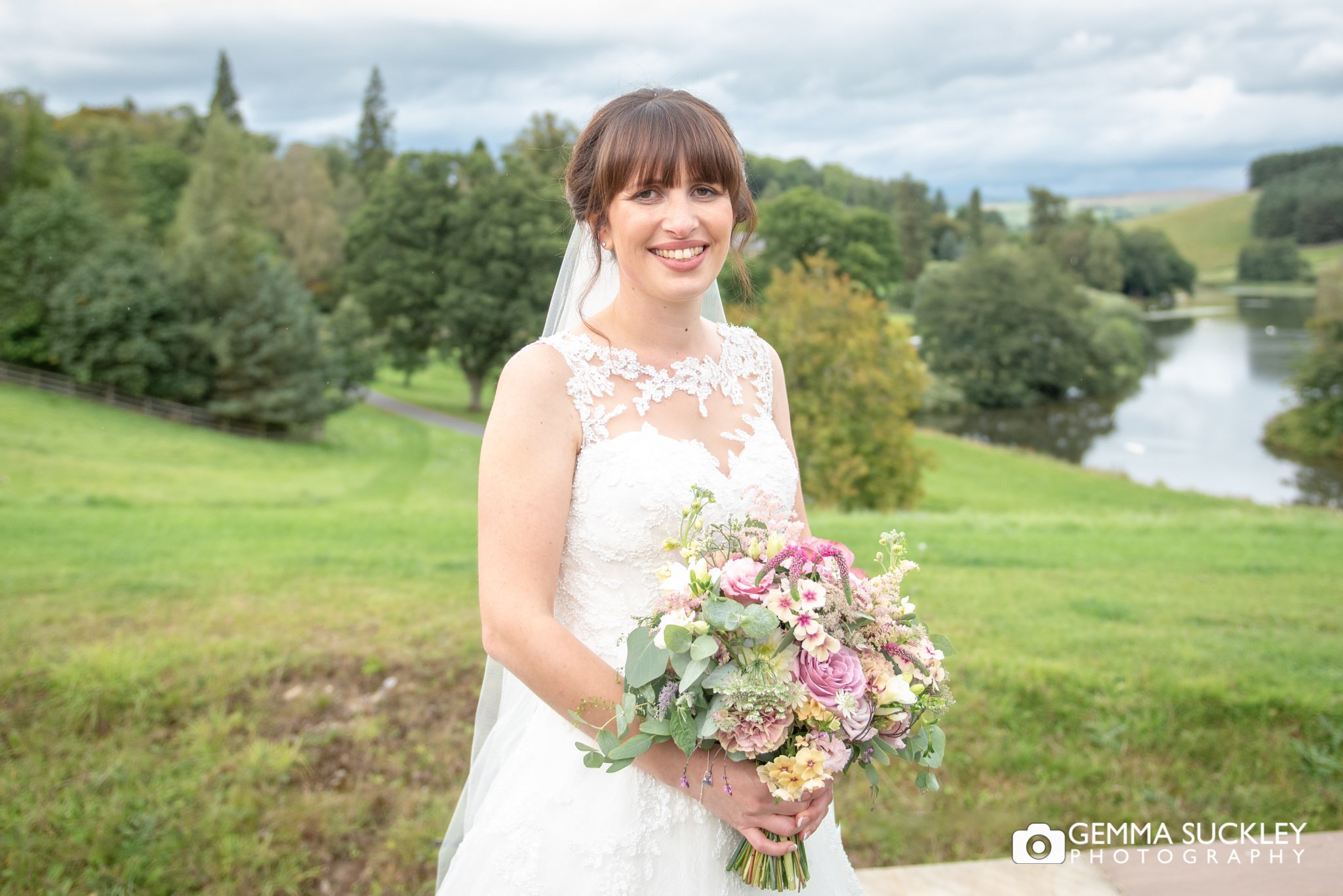 a bride in front of the coniston lake in skipton