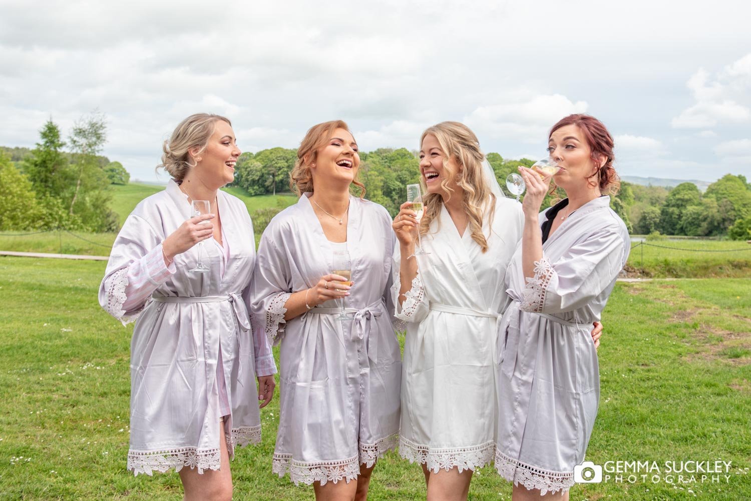 bridesmaids in dressing gowns outside coniston hotel in skipton