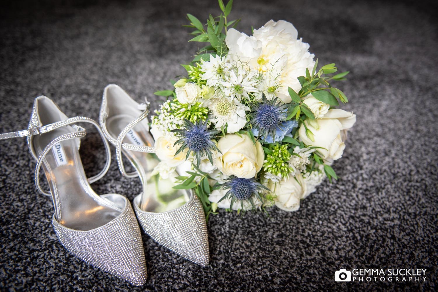 dunes bridal shoes next to the bouquet 