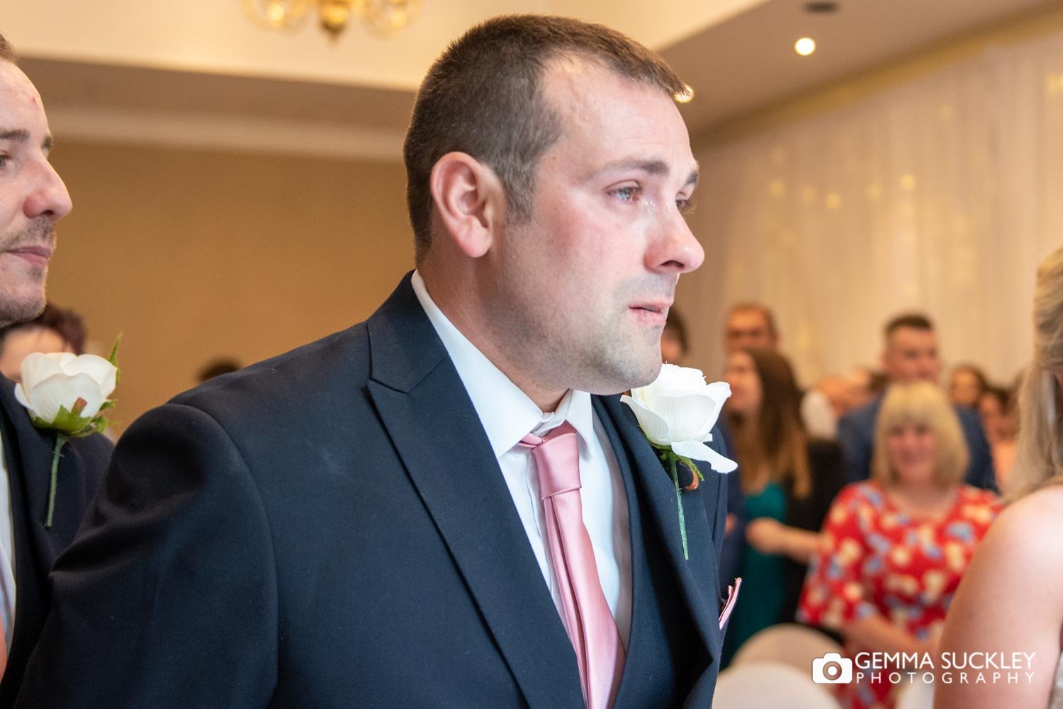 the groom with tears in his eyes at hollins hall wedding