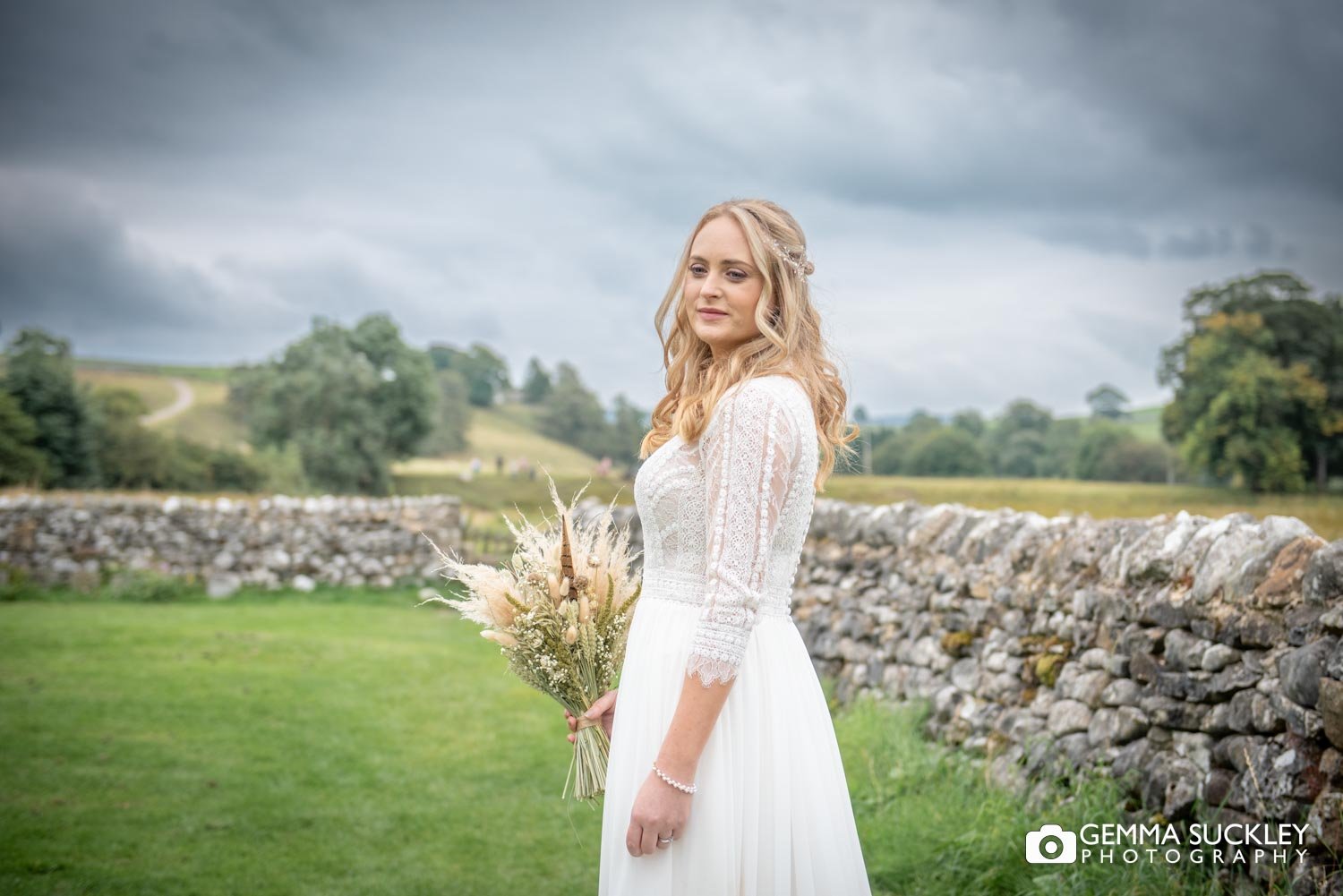 bride in front of the scenic north yorkshire rolling hills
