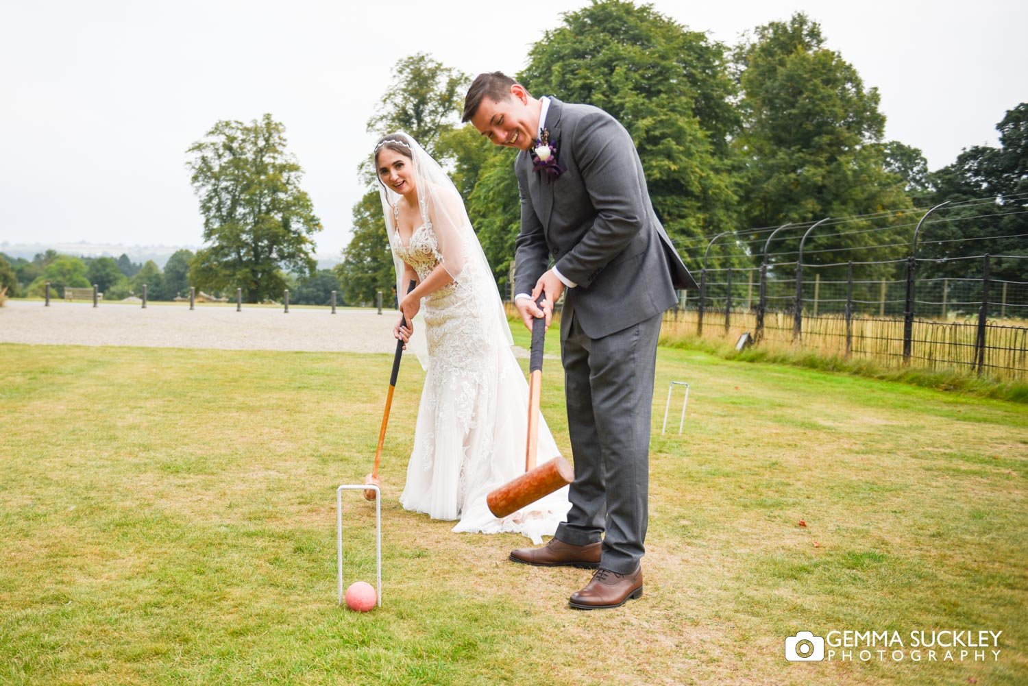 bride and groom playing croquet at swinton park