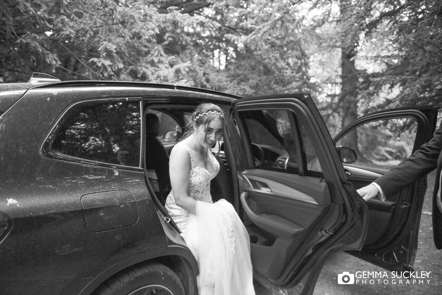 the bride getting out the car at swinton park