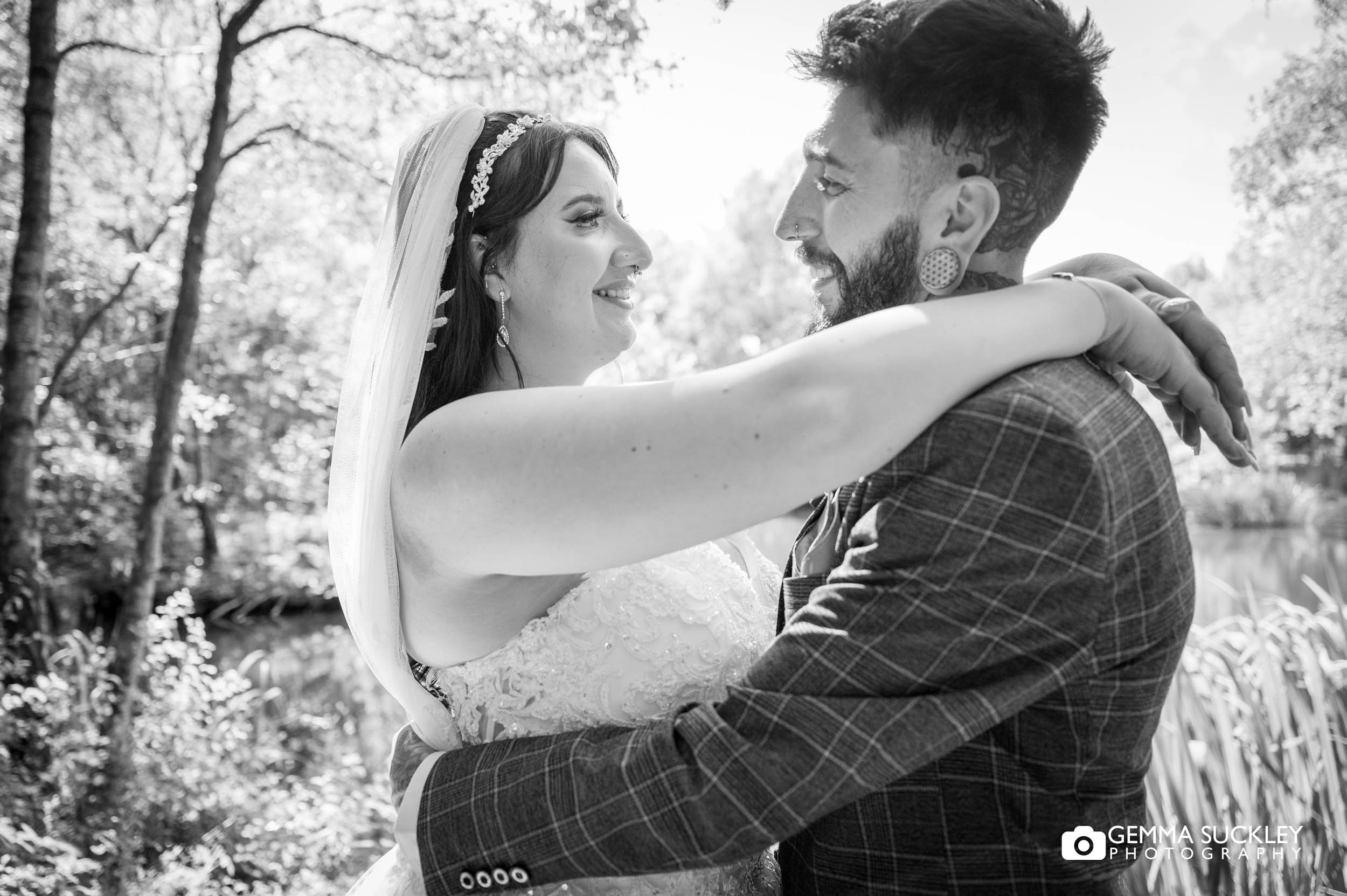 just married couple hugging at chevin country park hotel 