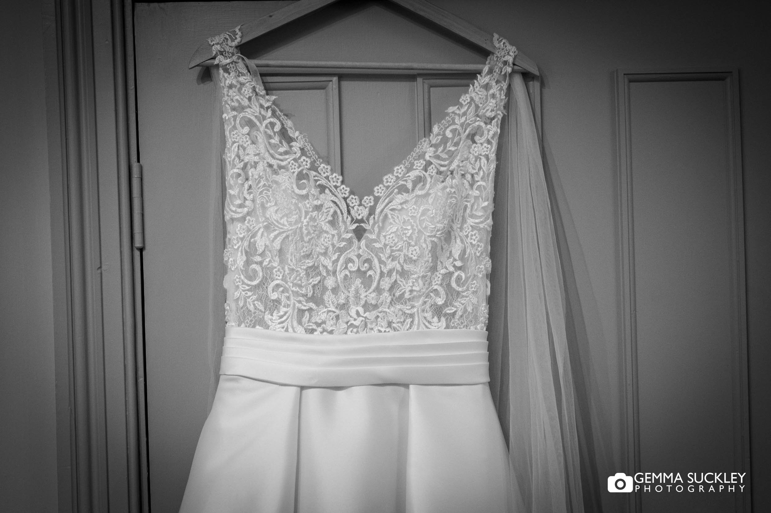 a wedding dress hung up