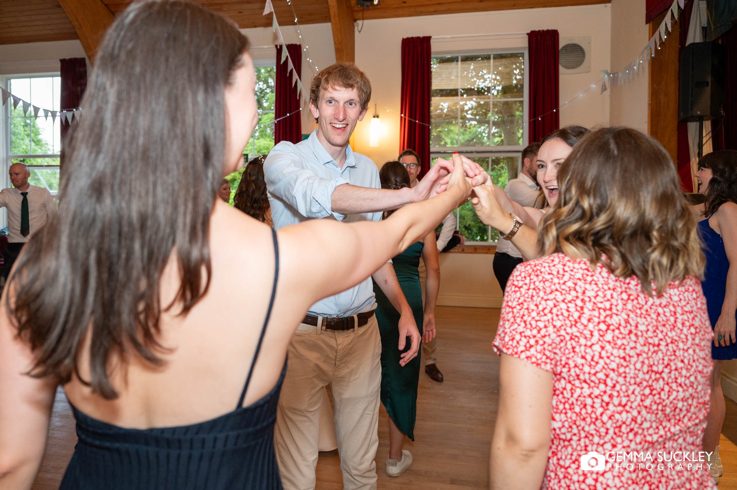 a ceilidh dances at bolton abbey village hall wedding