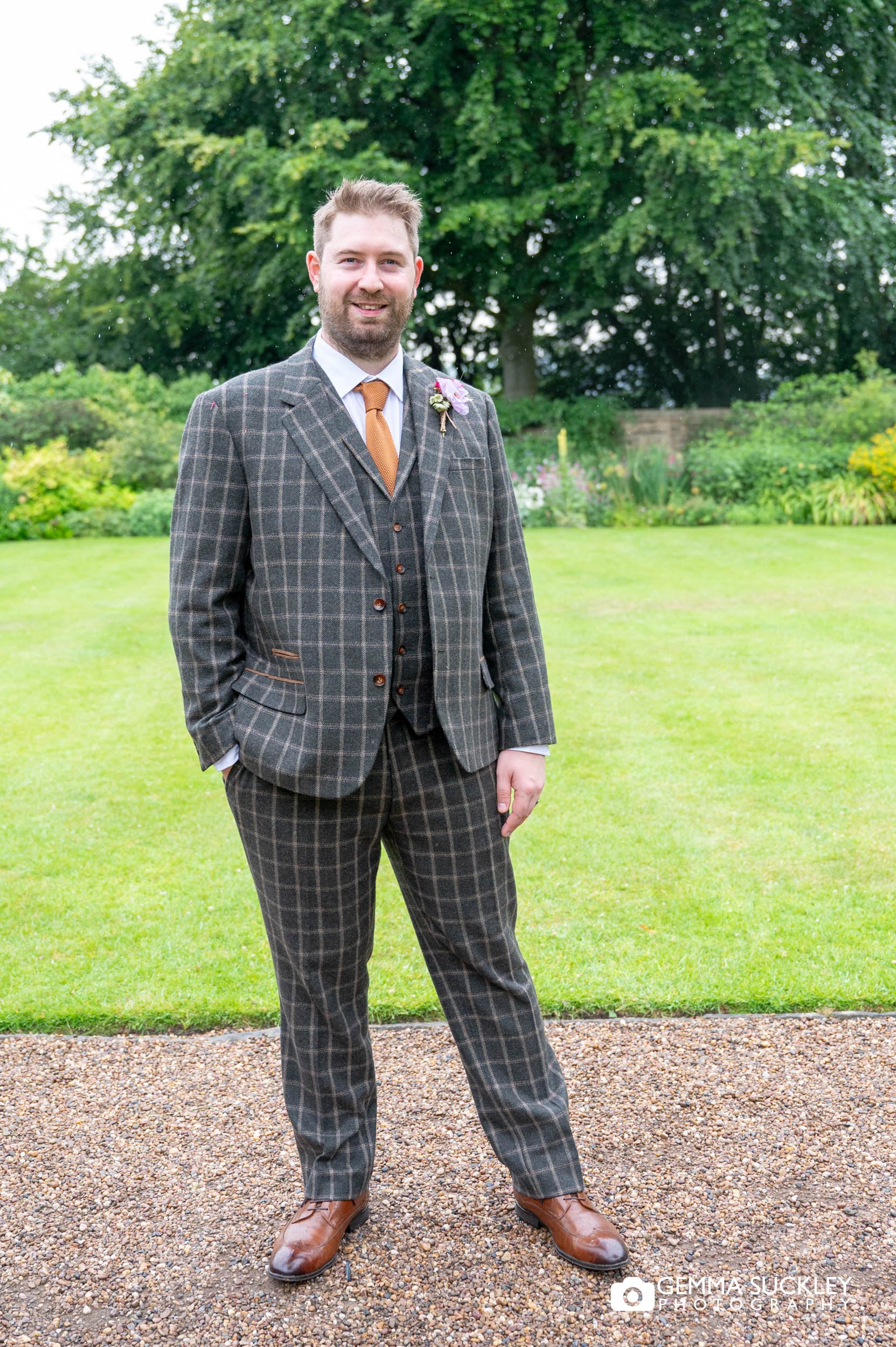 groom in the walled garden at east riddlesden hall