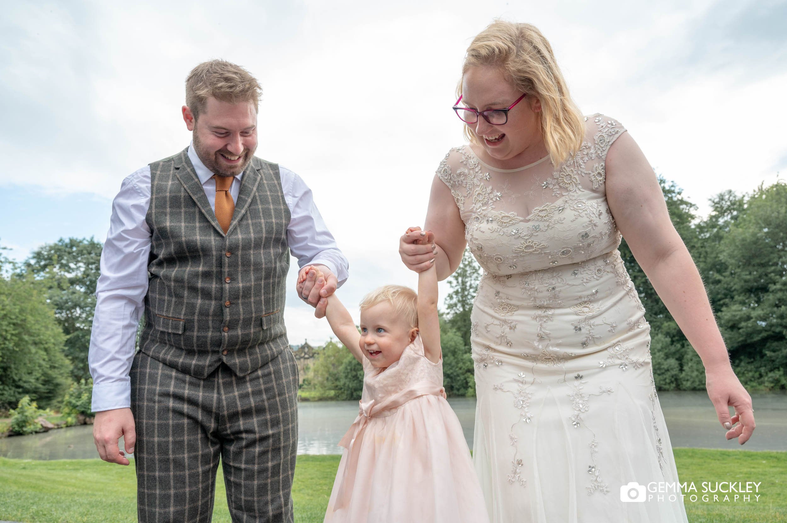 married couple with the baby at east riddlesden hall