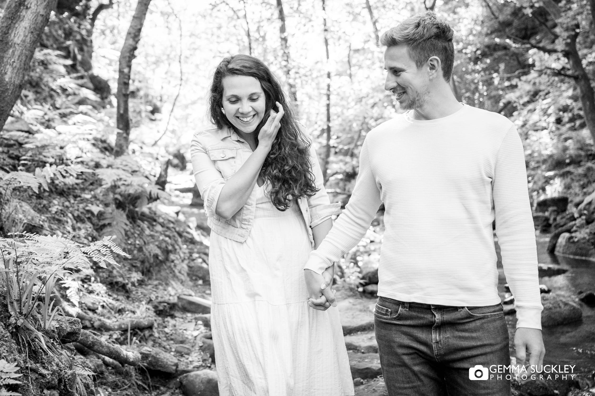 engaged couple laughing 