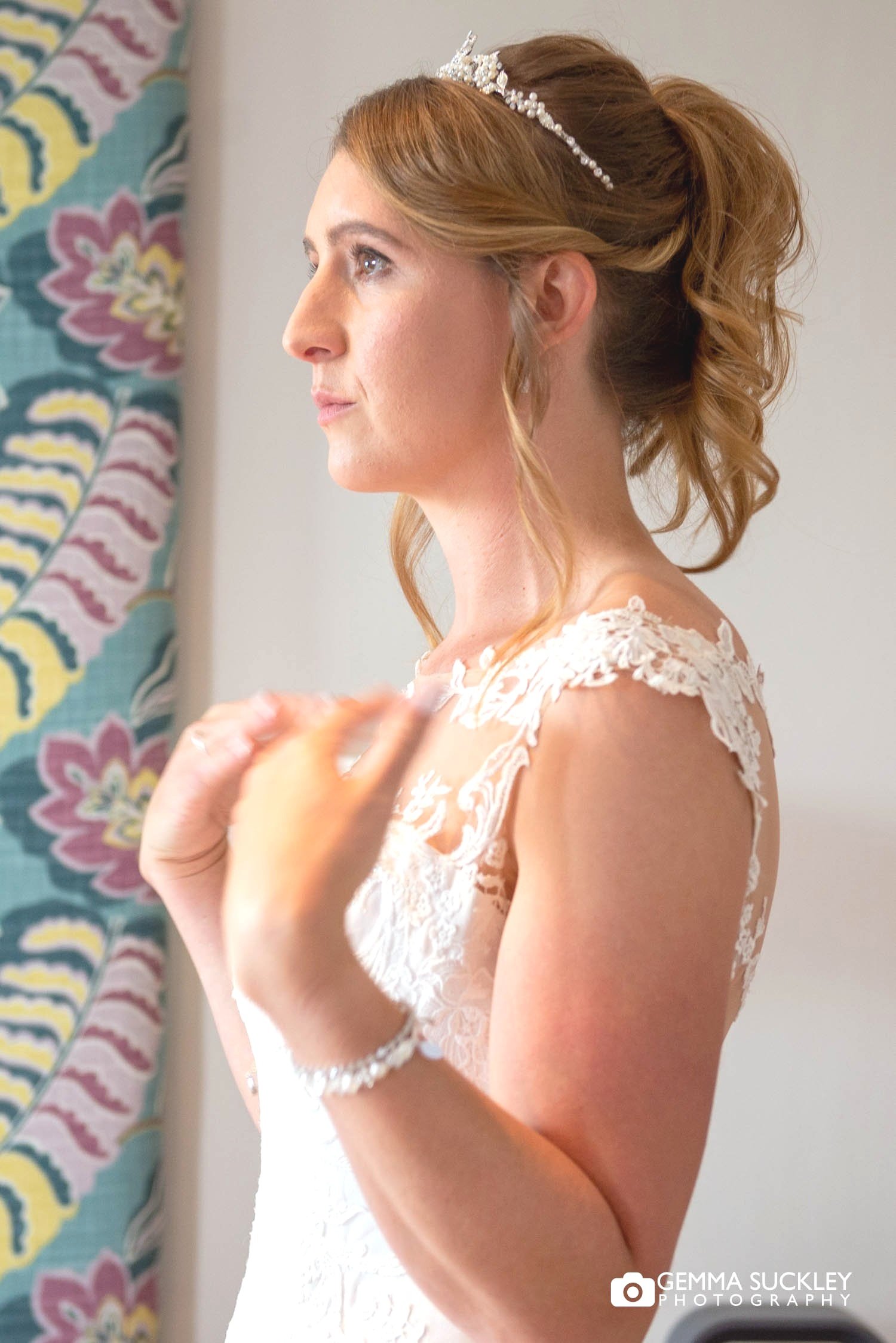 a bride holding back tears