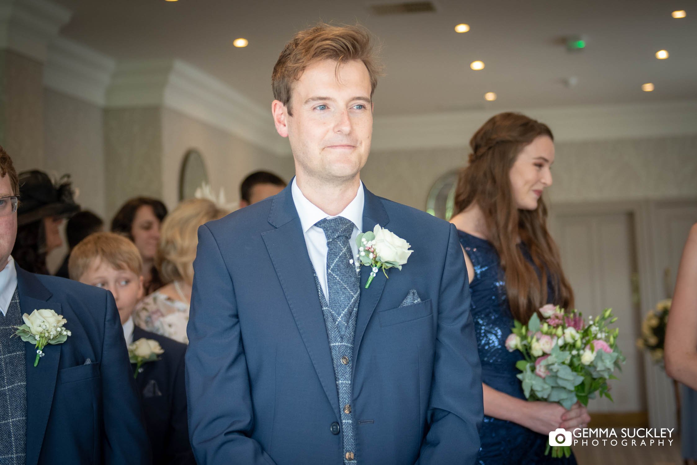 groom awaiting his bride at the devonshire fell