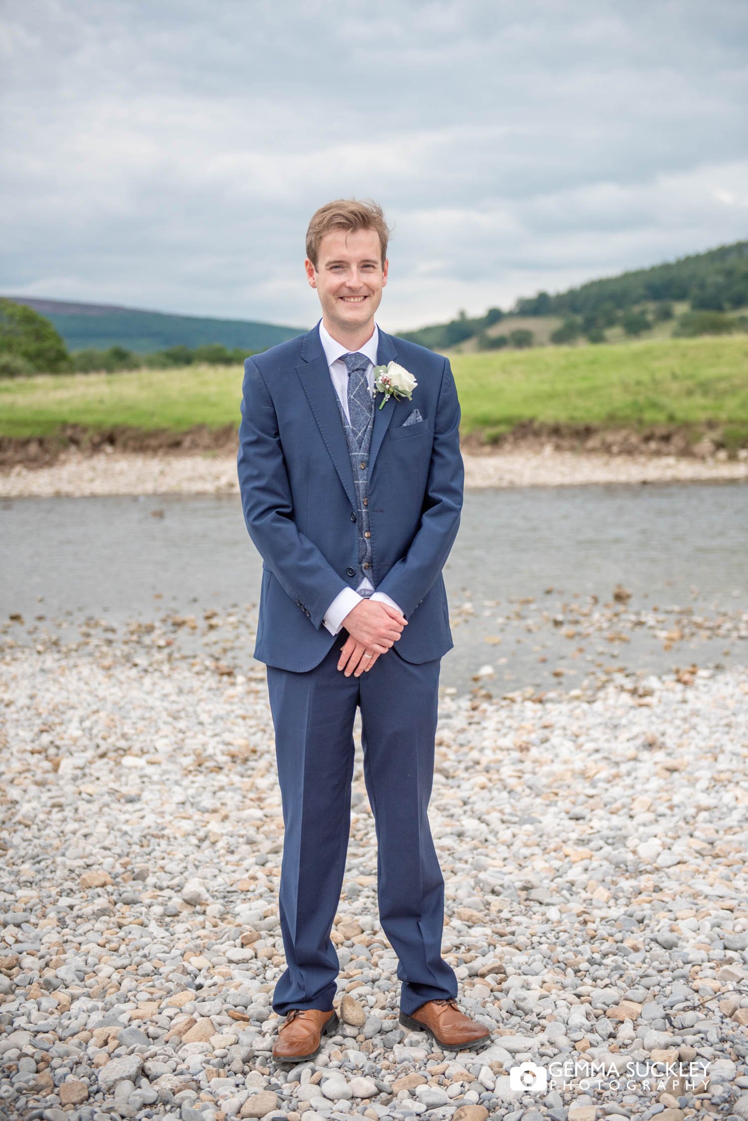 groom at burnsall river