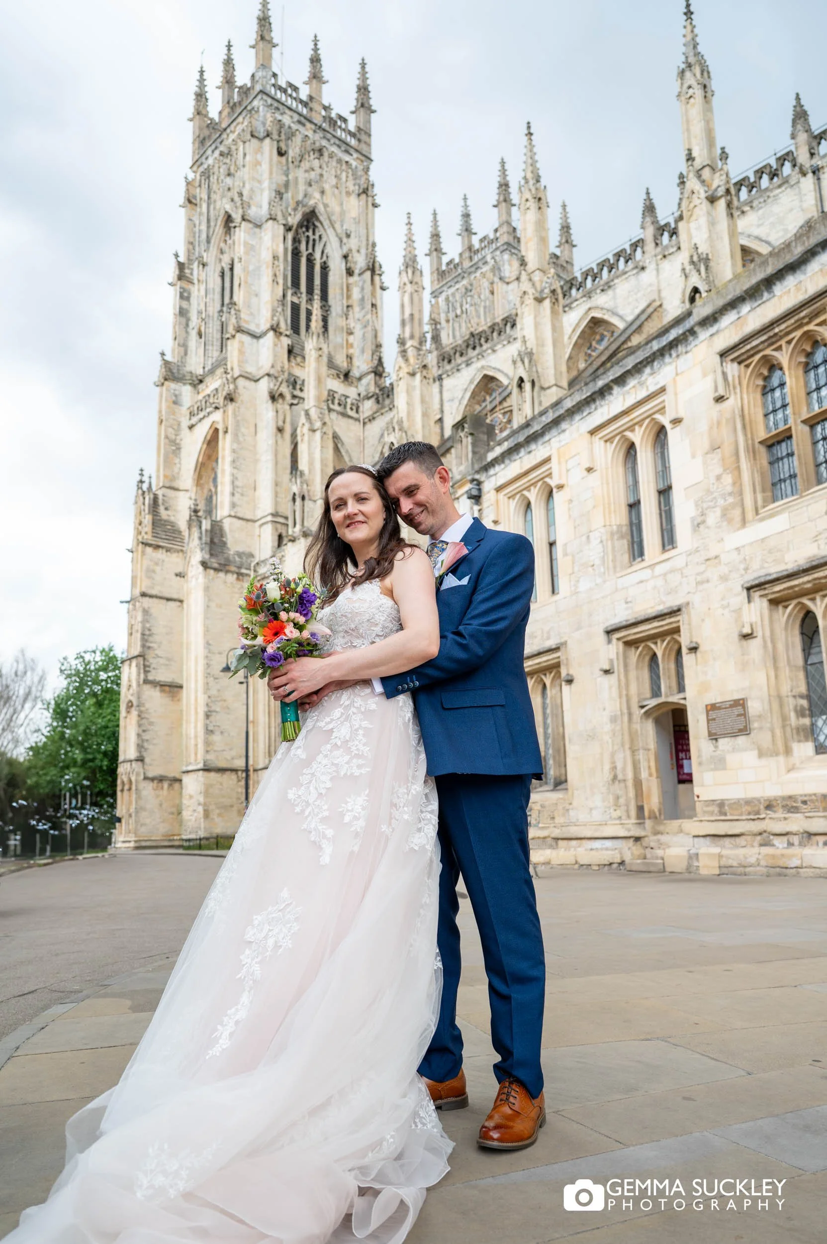 bride and groom at york minster
