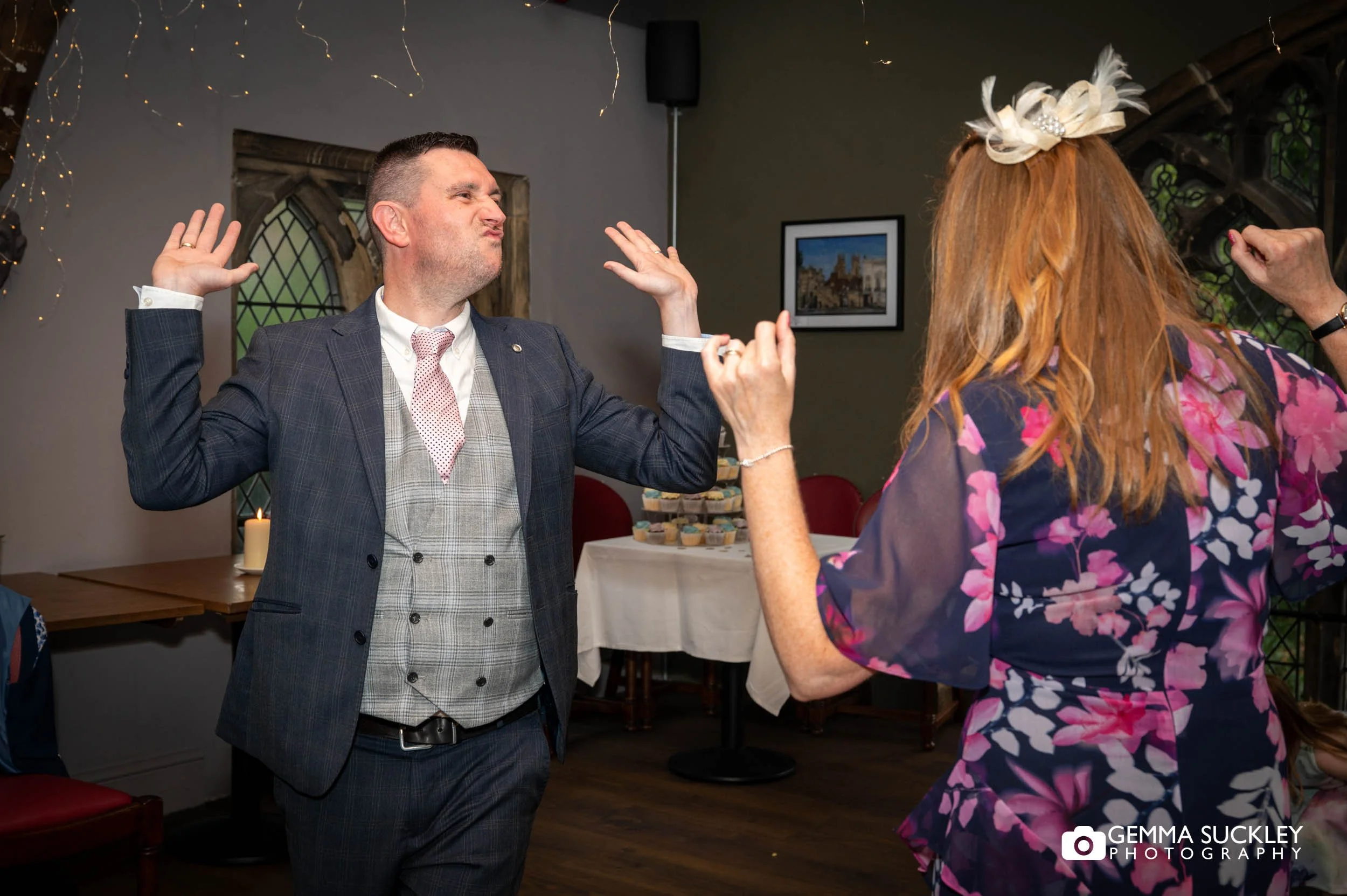 wedding guests dancing at york minster refectory
