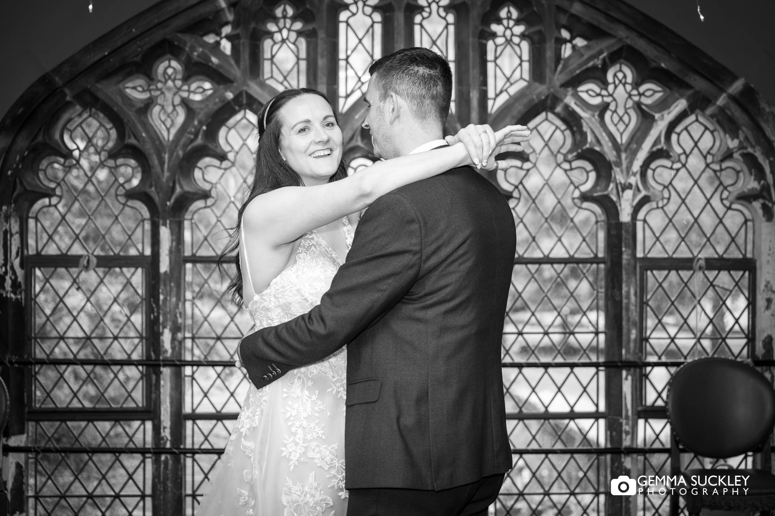 bride and groom dancing at york minster refectory