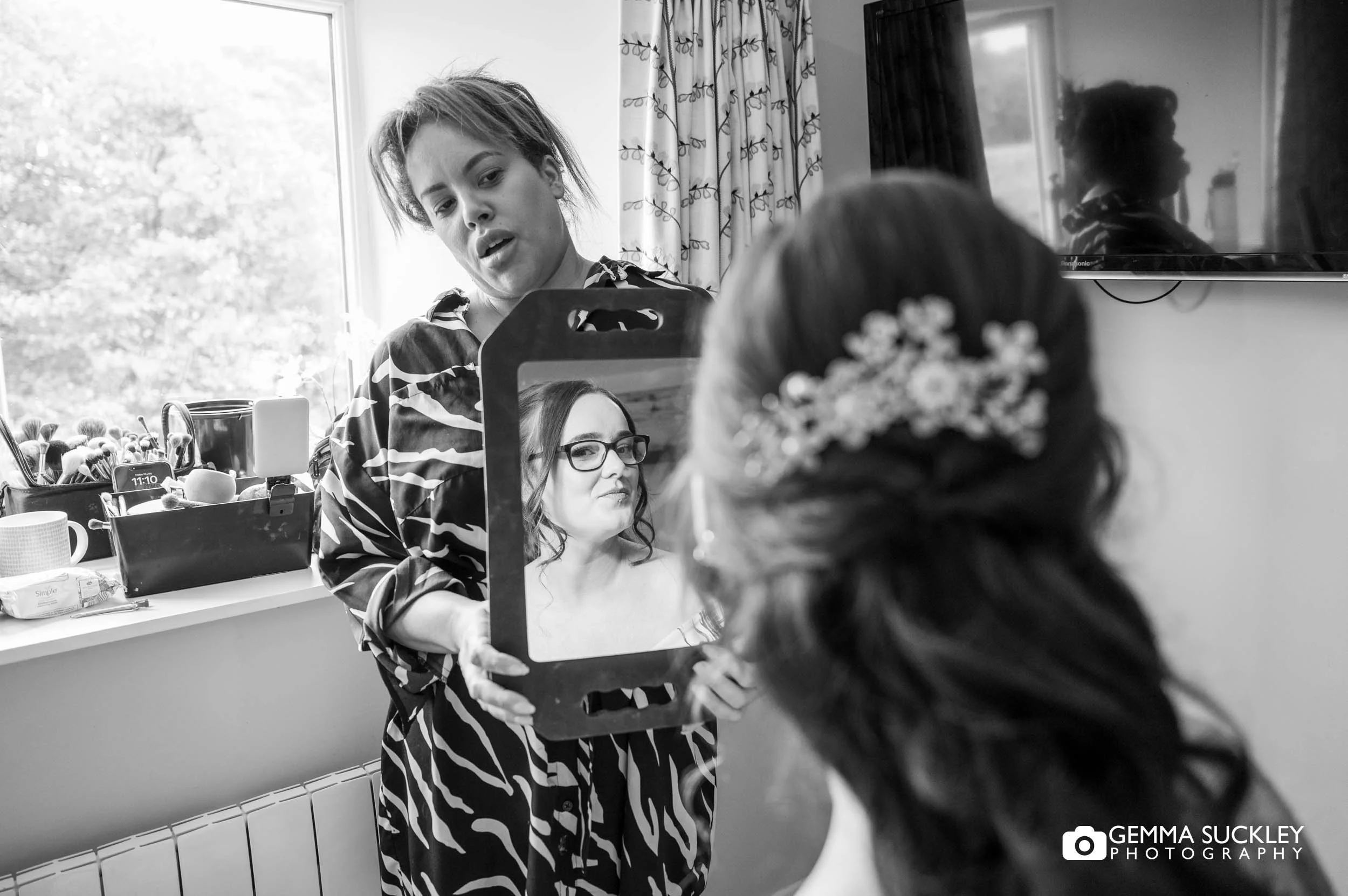 bride looking in the mirror