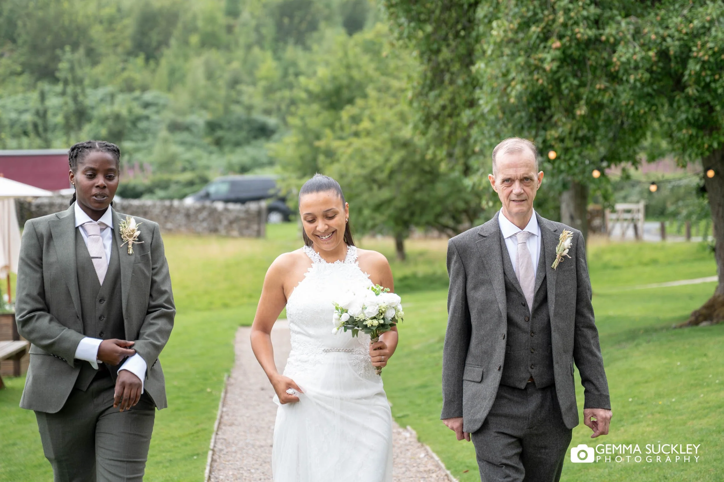 bride walking to the wedding ceremony