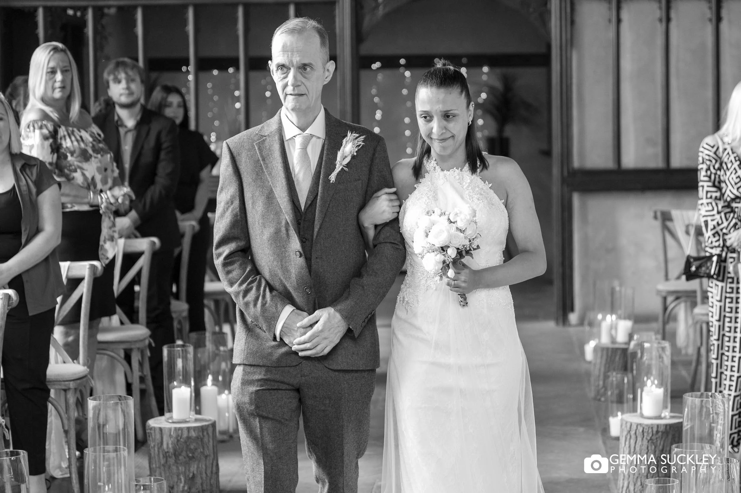 father of the bride walking his daughter down the aisle