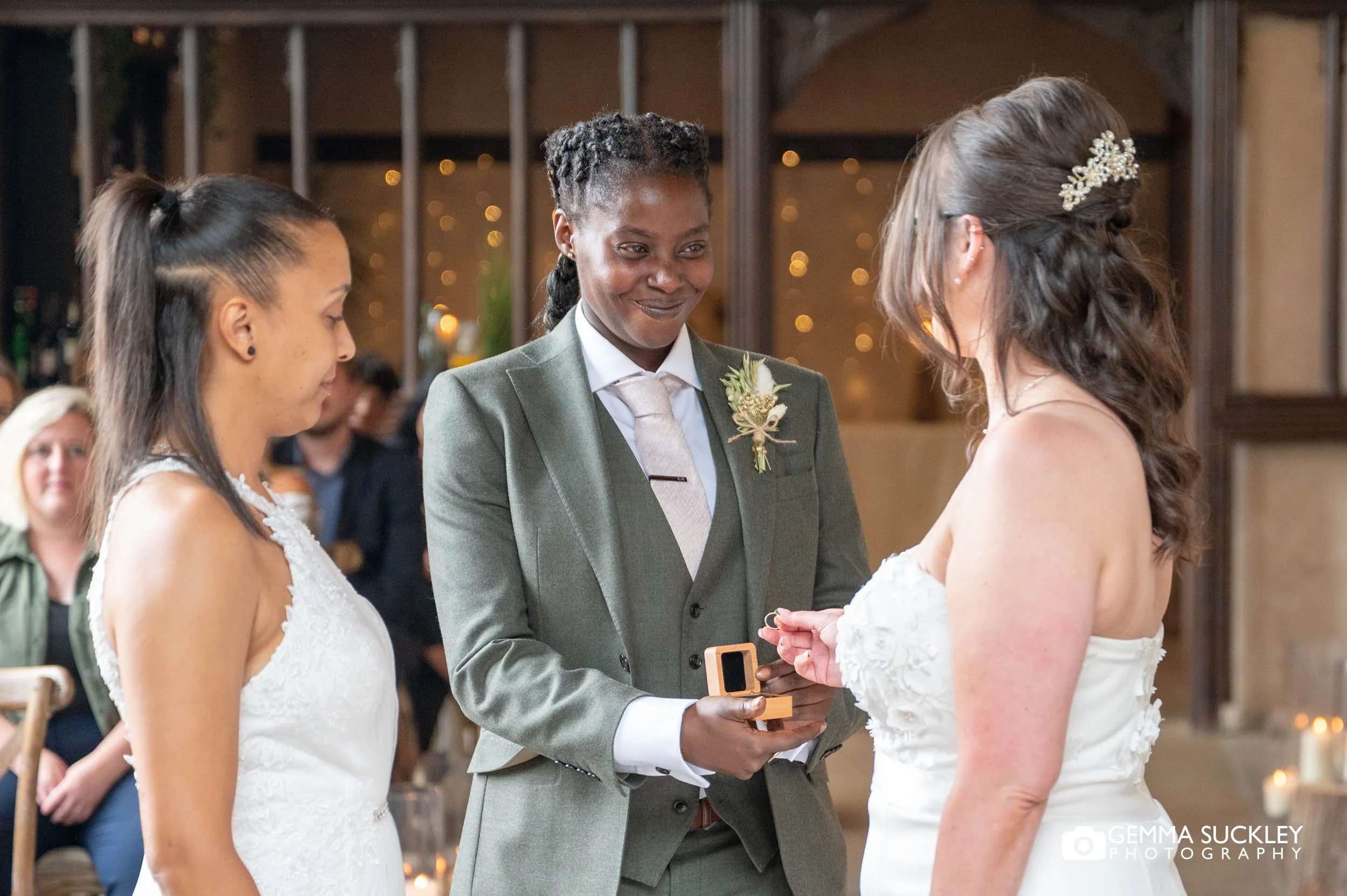 ring bear offer the ring to the bride at the priests house