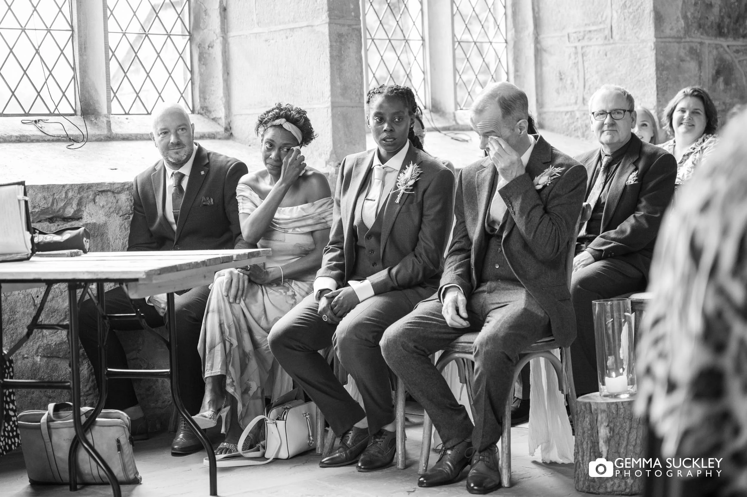 emotional wedding guests at the priests house