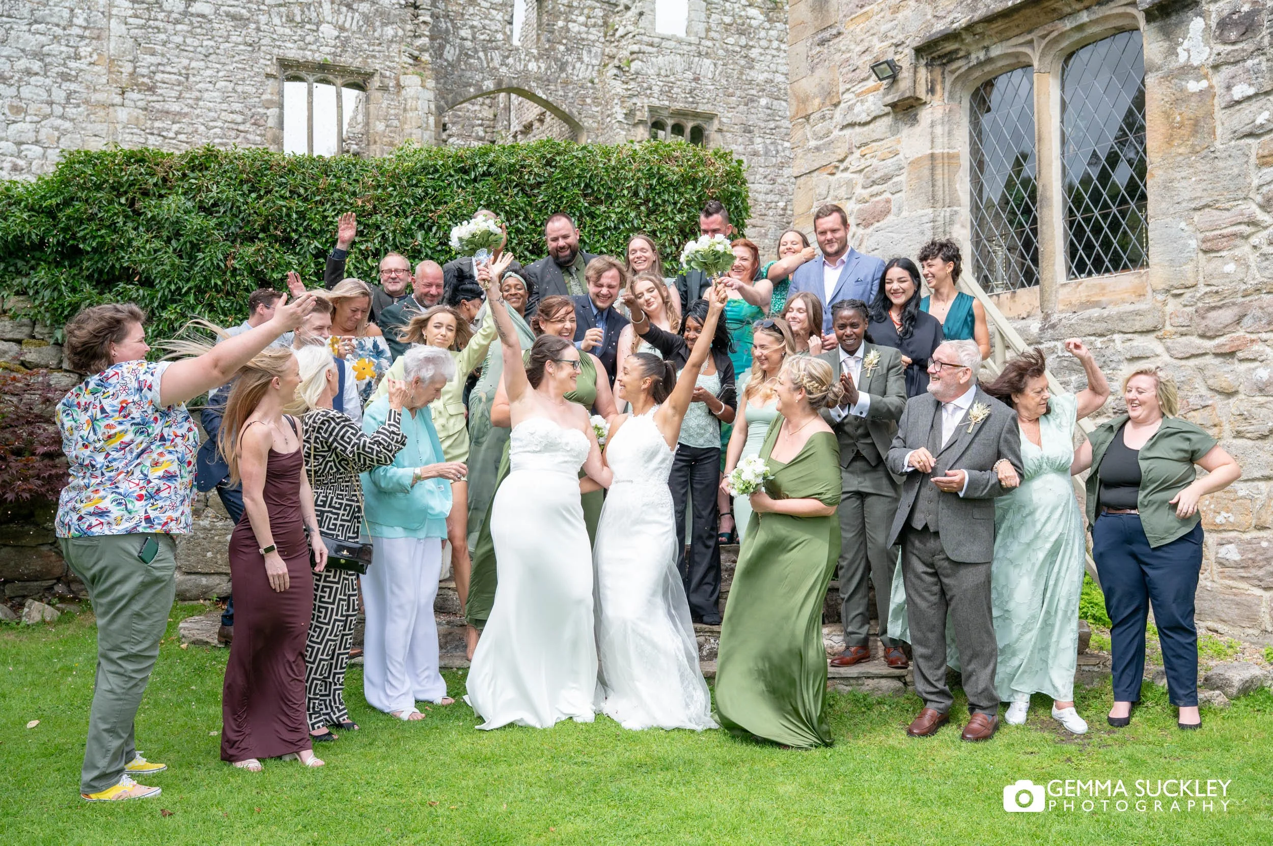 wedding guests throw confetti at barden tower