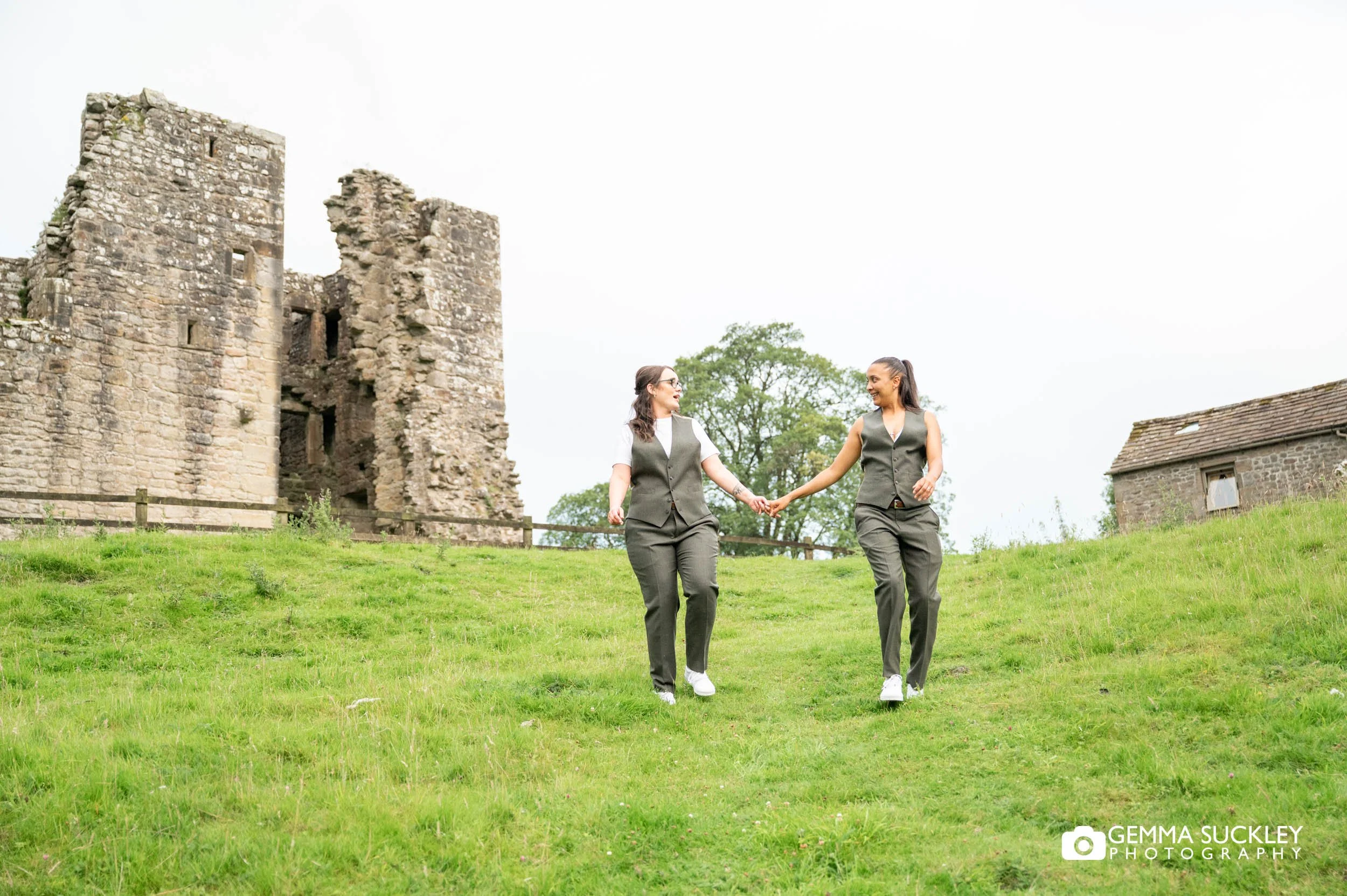 brides in their suits at barden tower