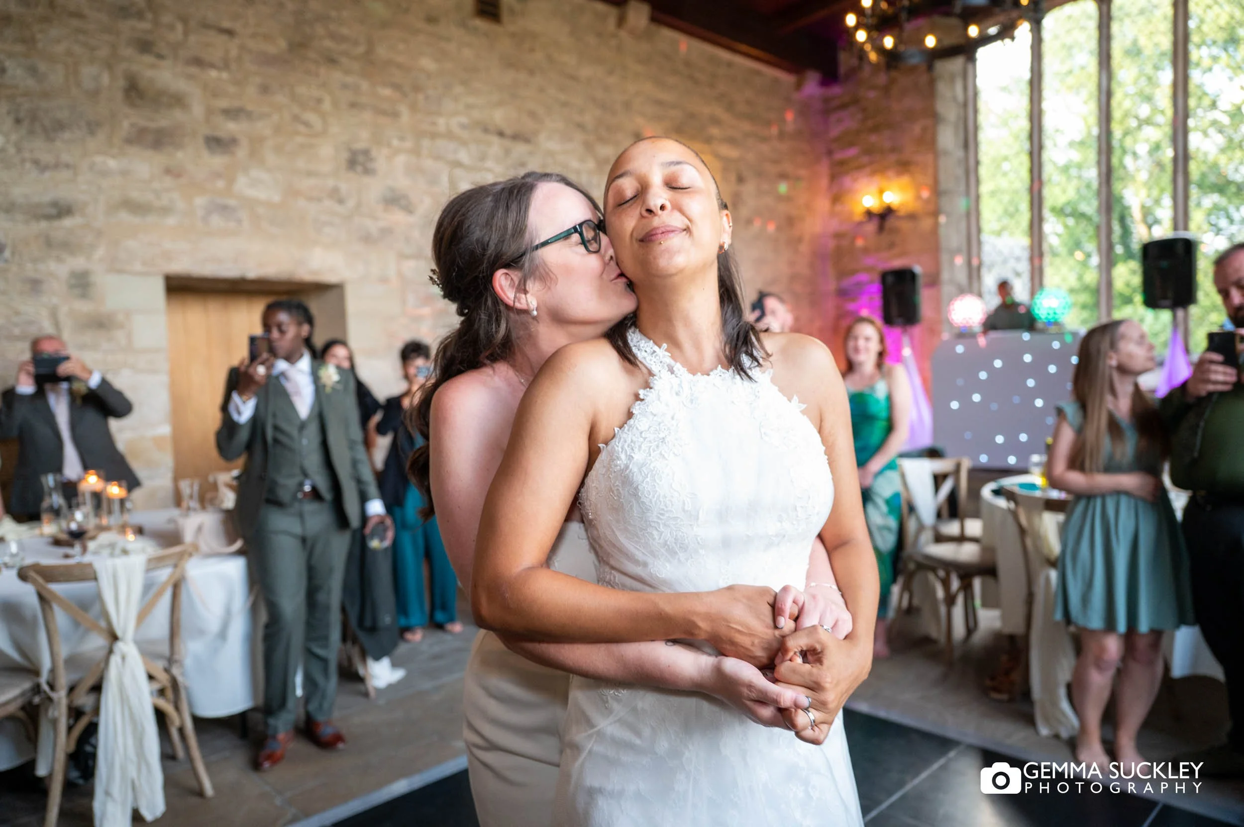 newly-weds take to the floor for their first dance