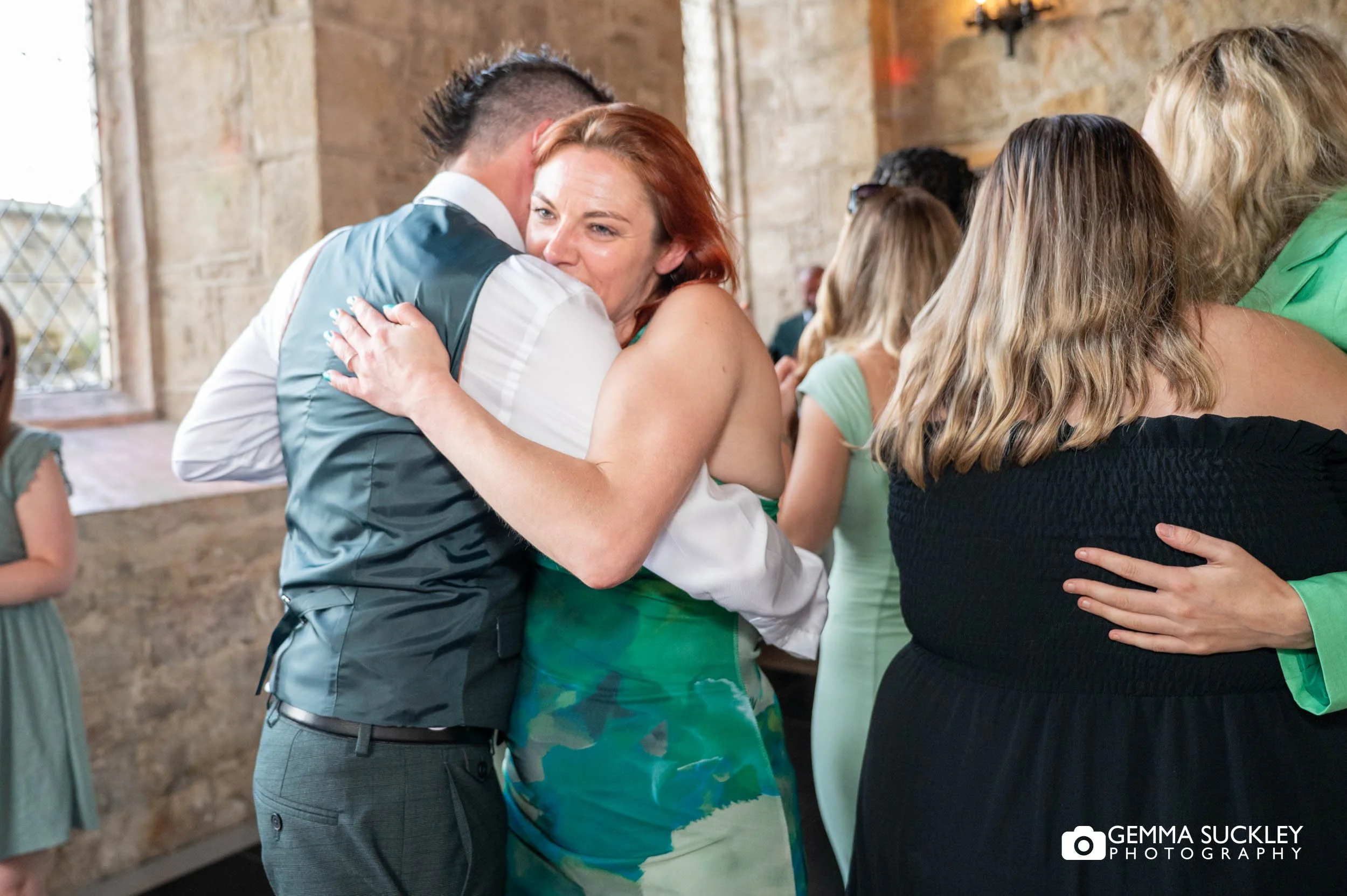 wedding guests dancing at the priests house