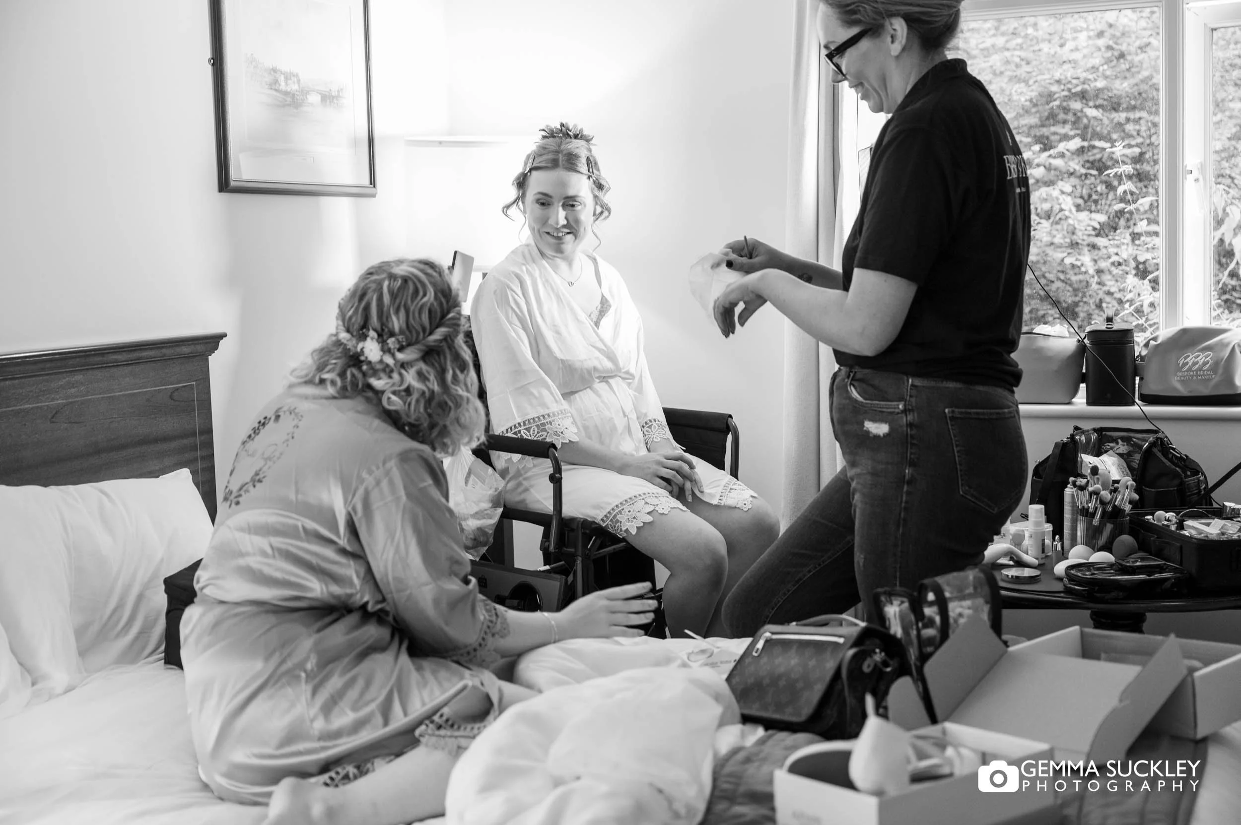 bride getting her make done at hollins hall hotel