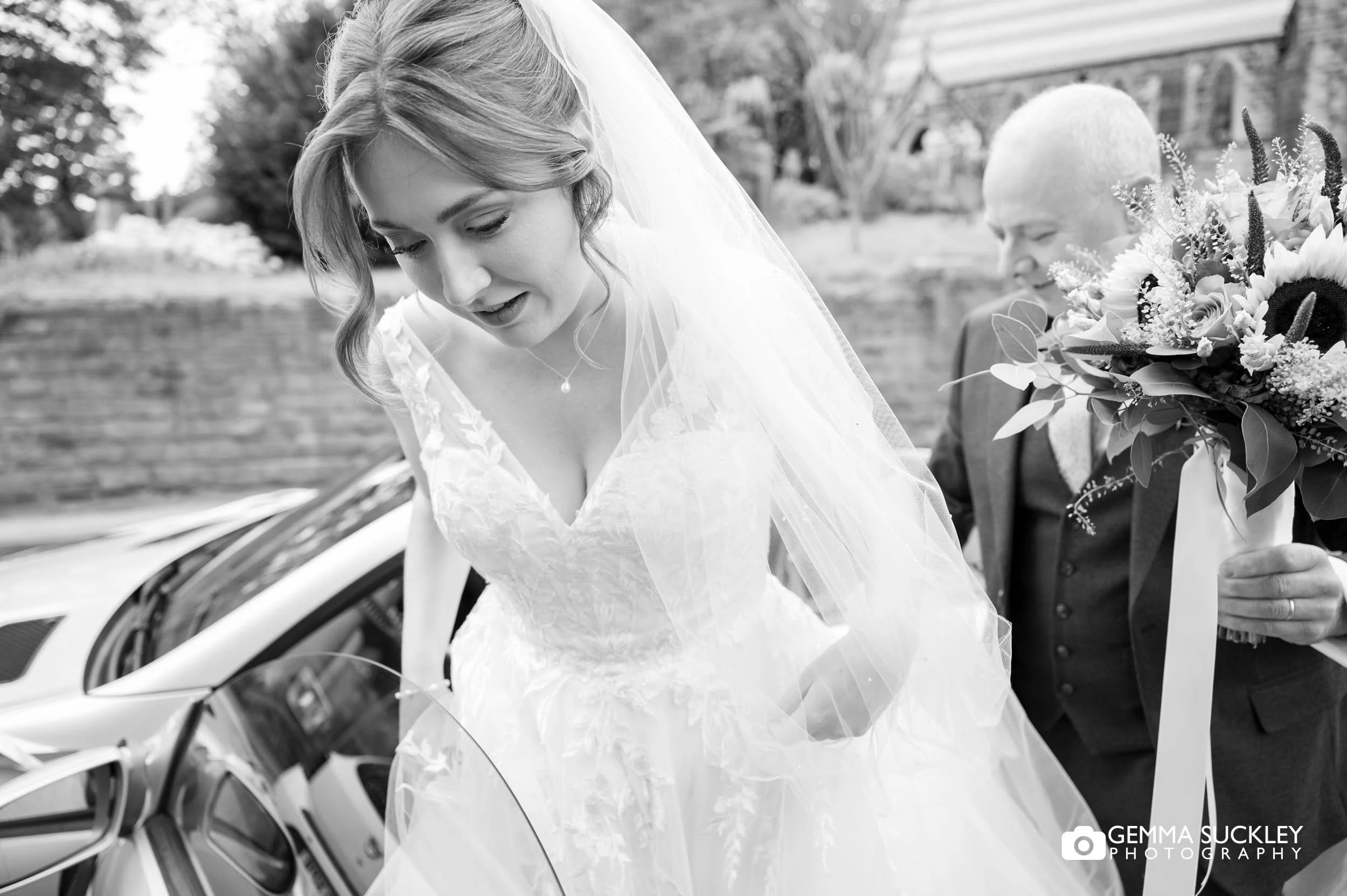 bride getting out the car