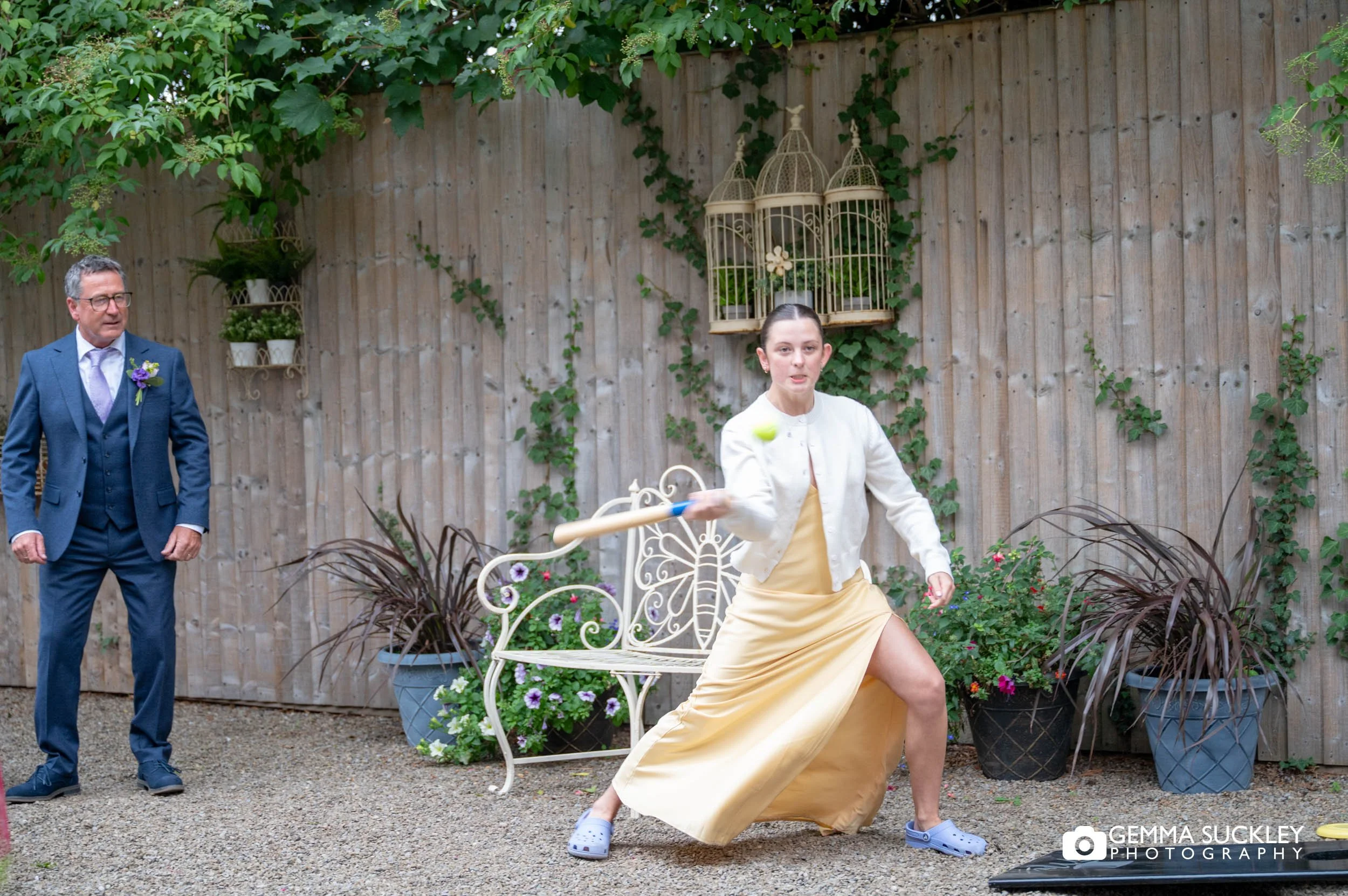 wedding guests playing cricket