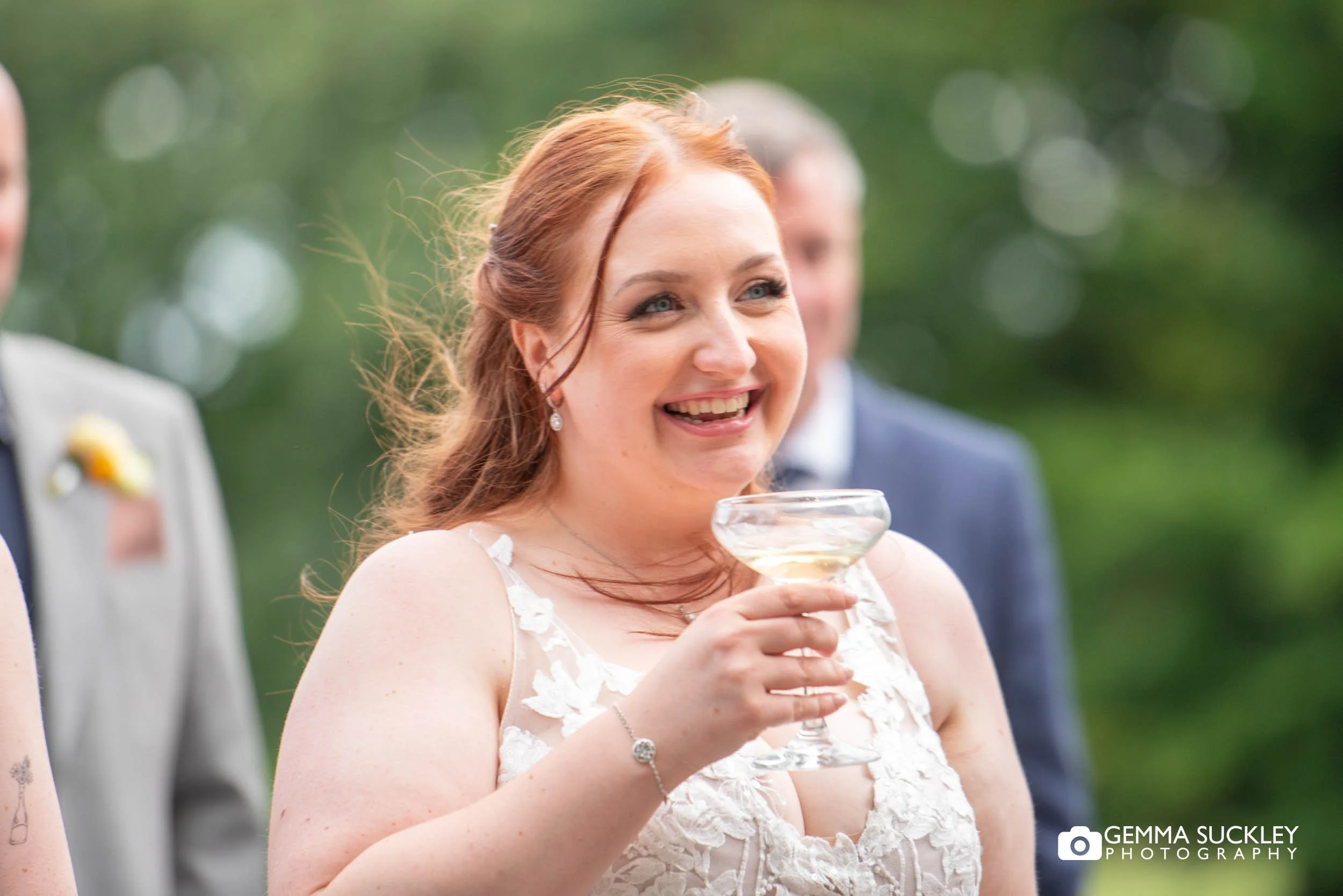 the bride laughing at the groom speech