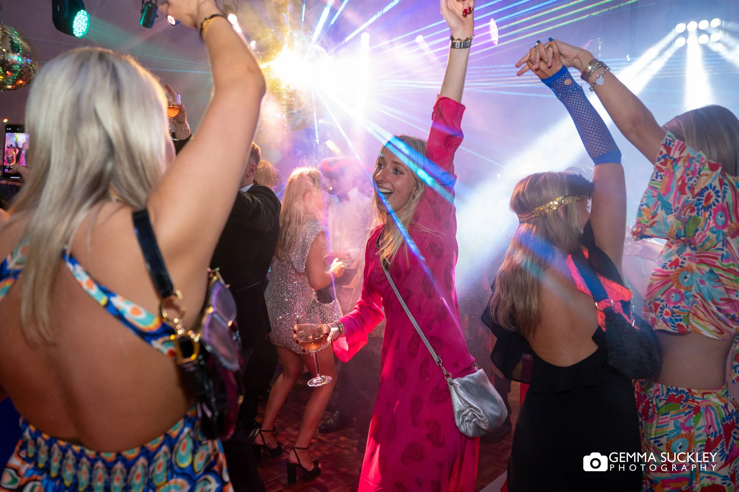 a full dance floor at a yorkshire wedding