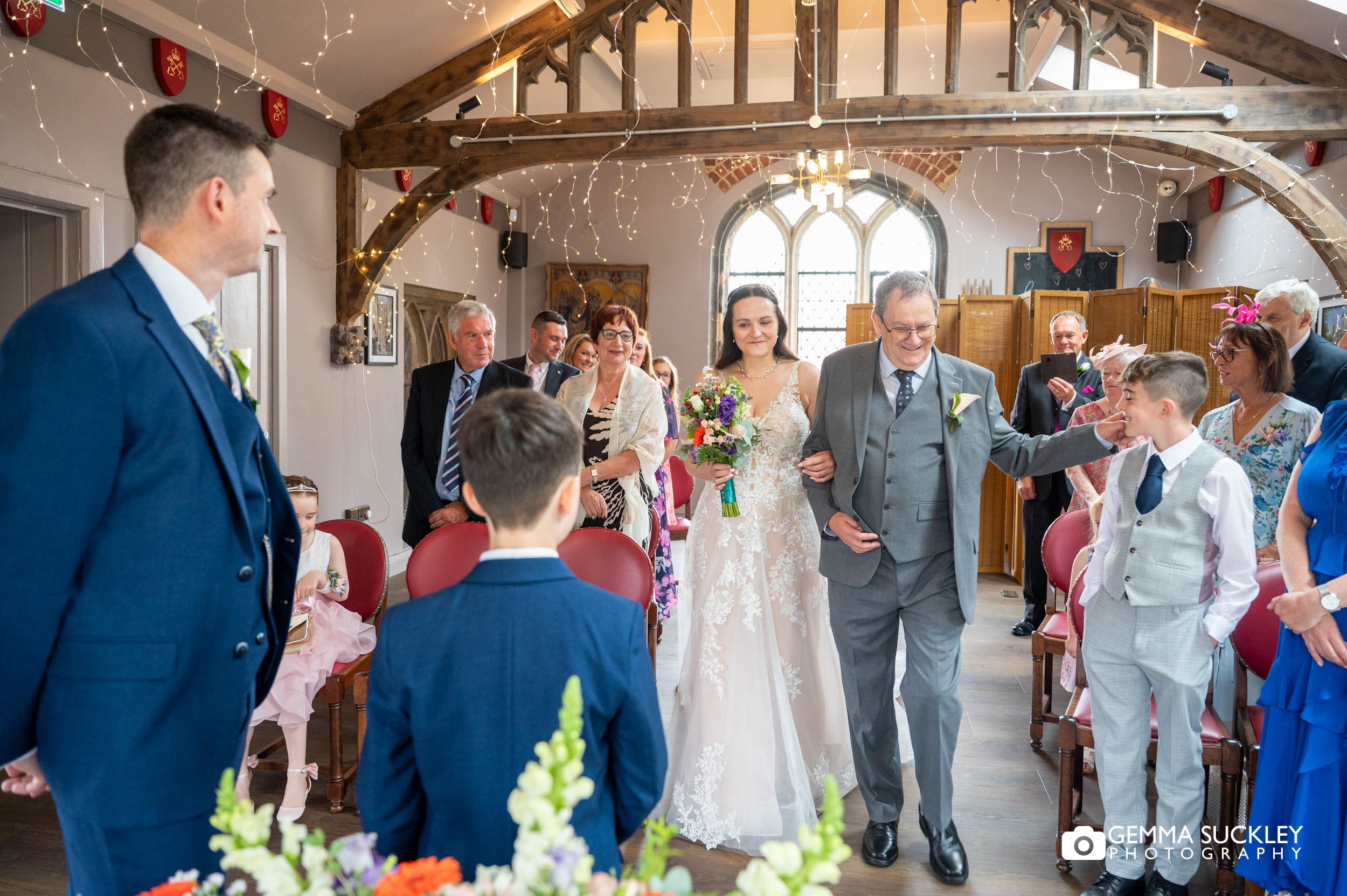bride walking down the aisle at york refractory