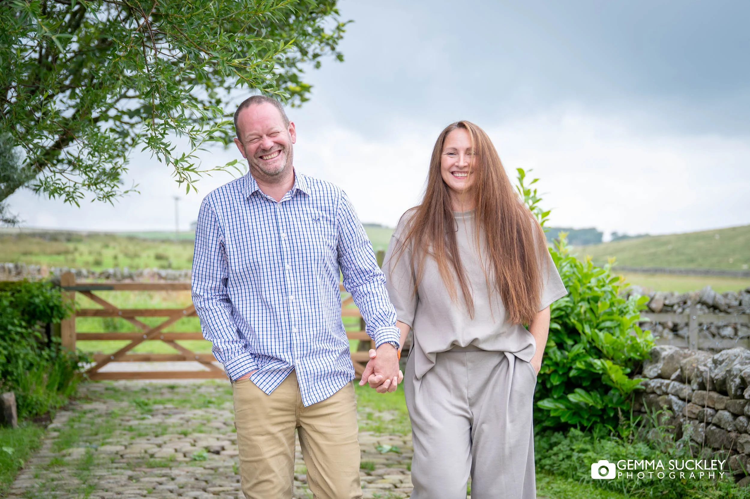 couple laughing in the yorkshire dales