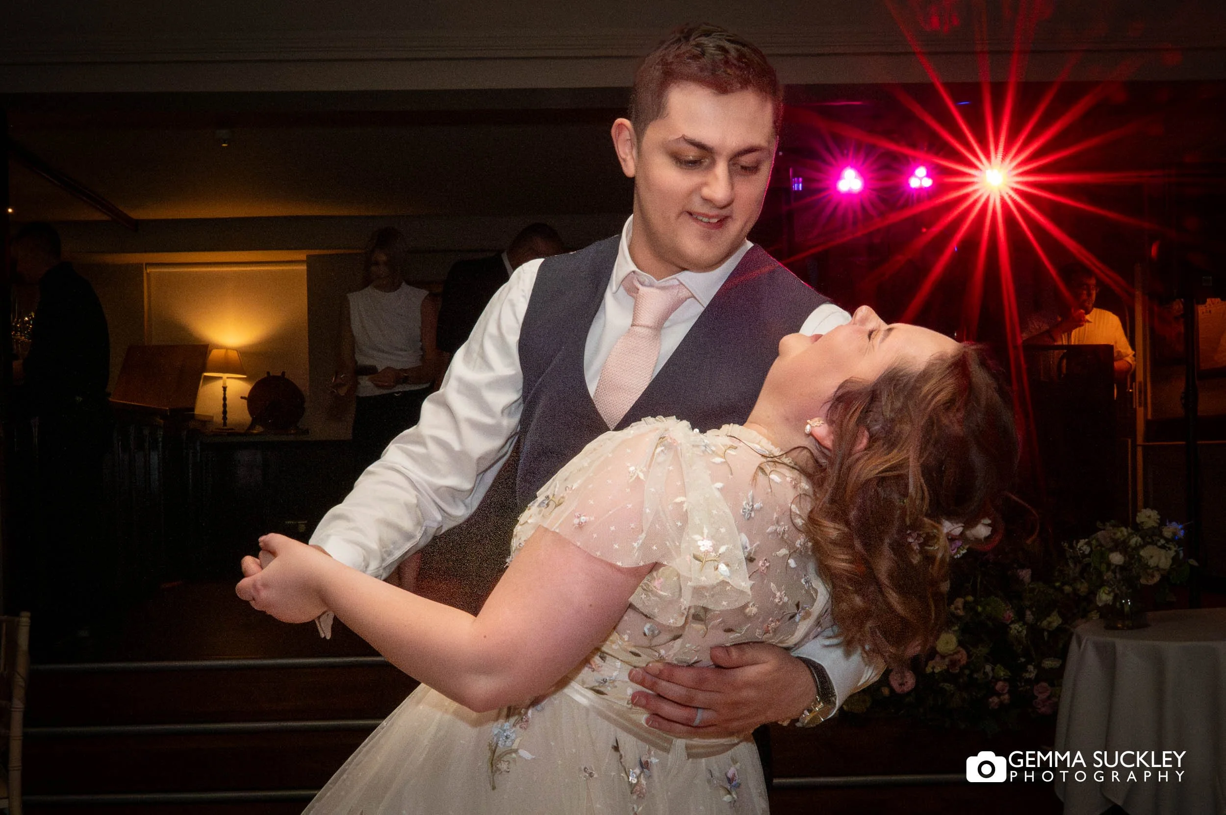 bride and groom dance at holdsworth house wedding