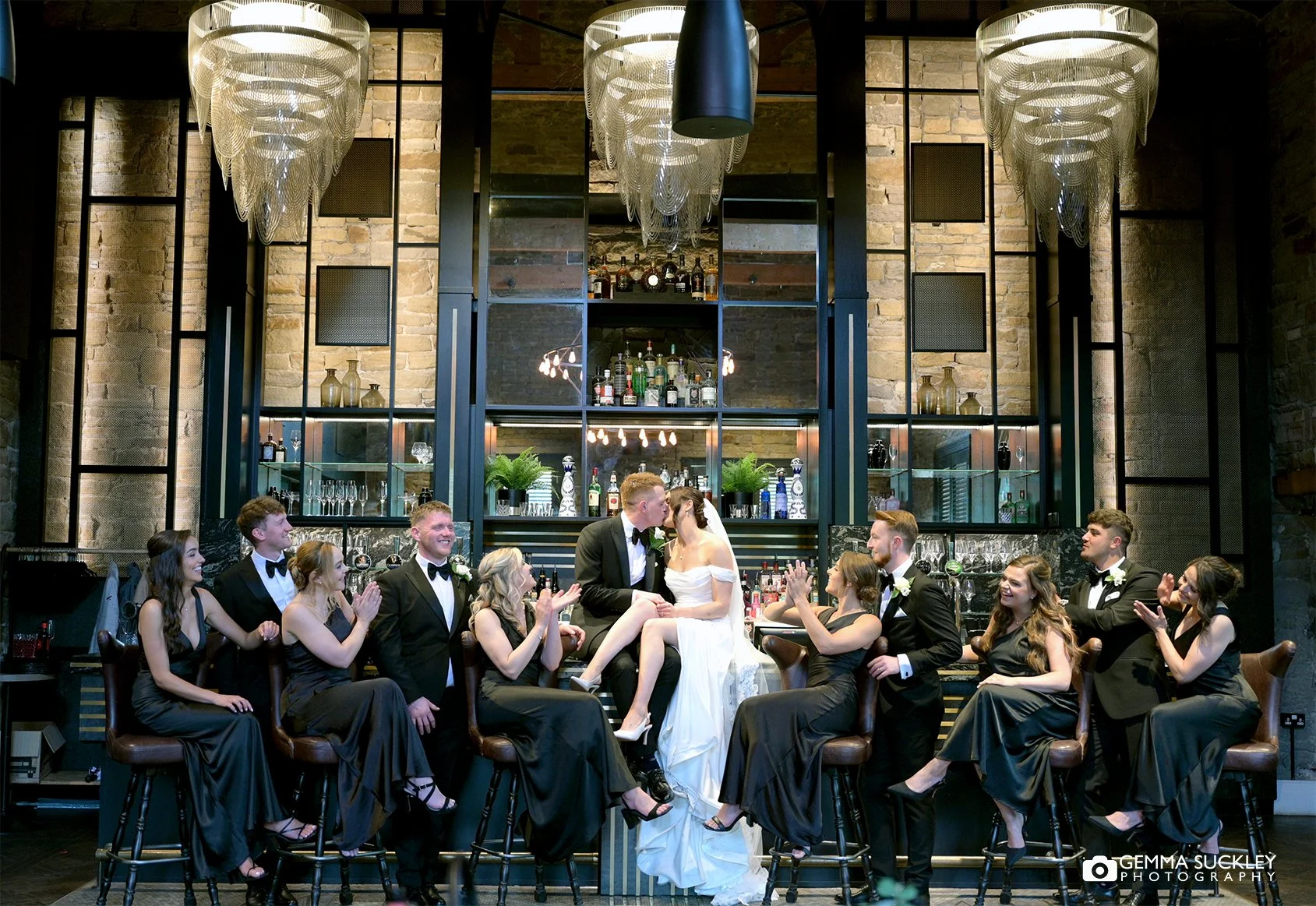 full wedding party on the bar at manor house