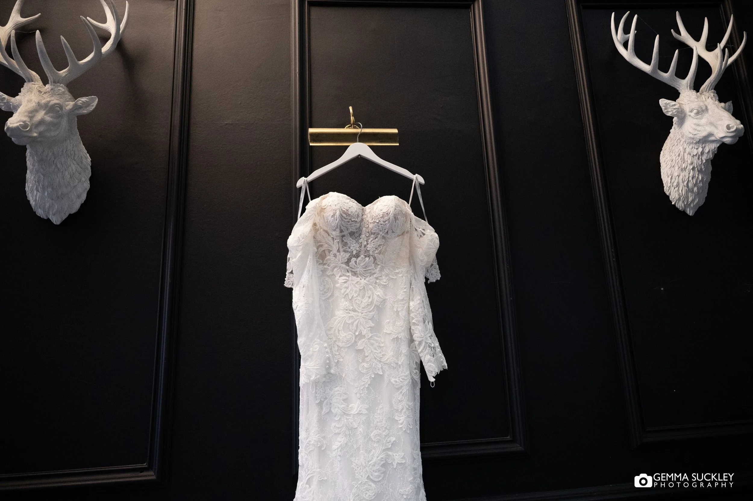 wedding dress hanging at shringley hall