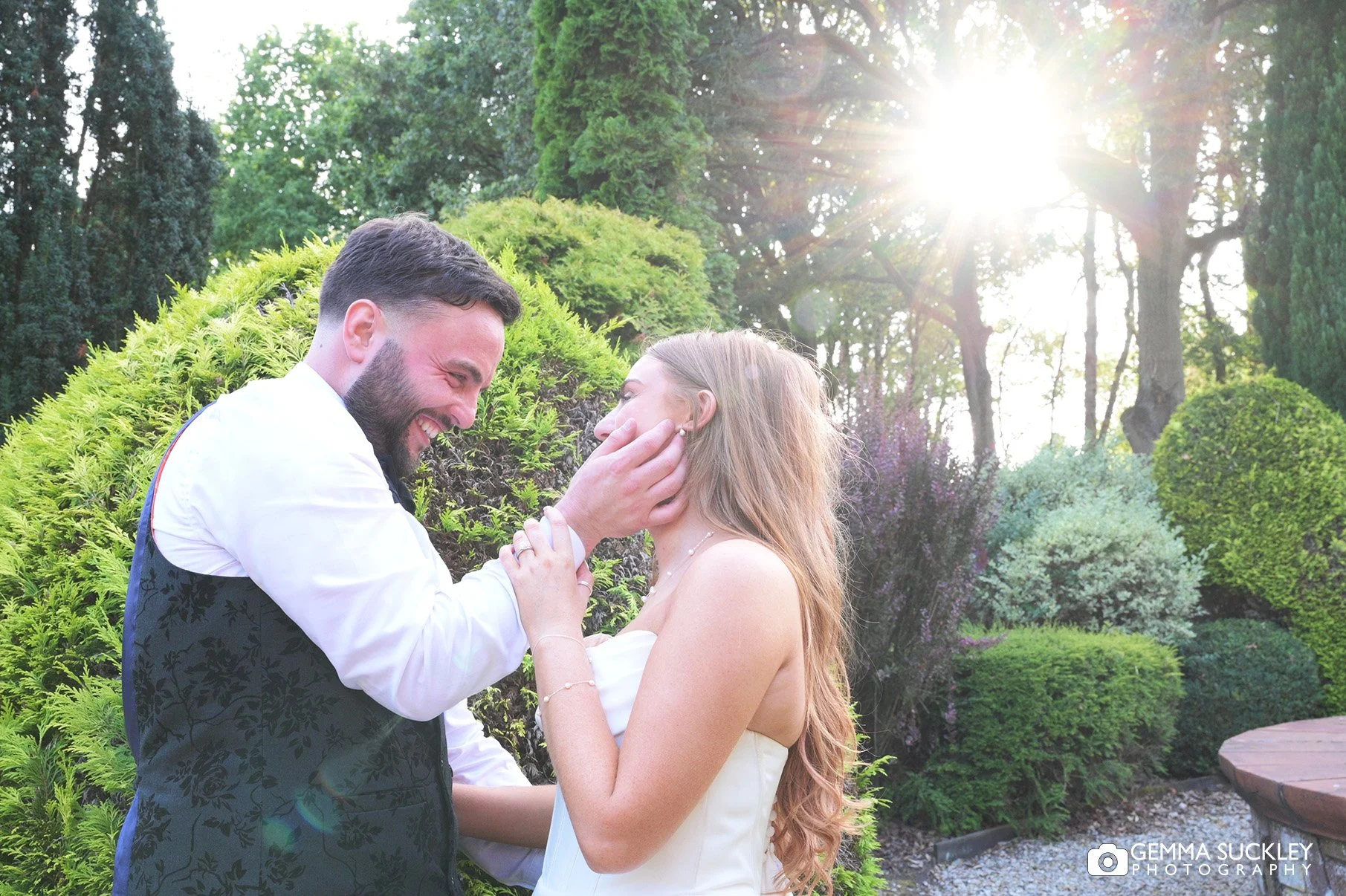 groom looking lovingly at his bride at nunsmere hall