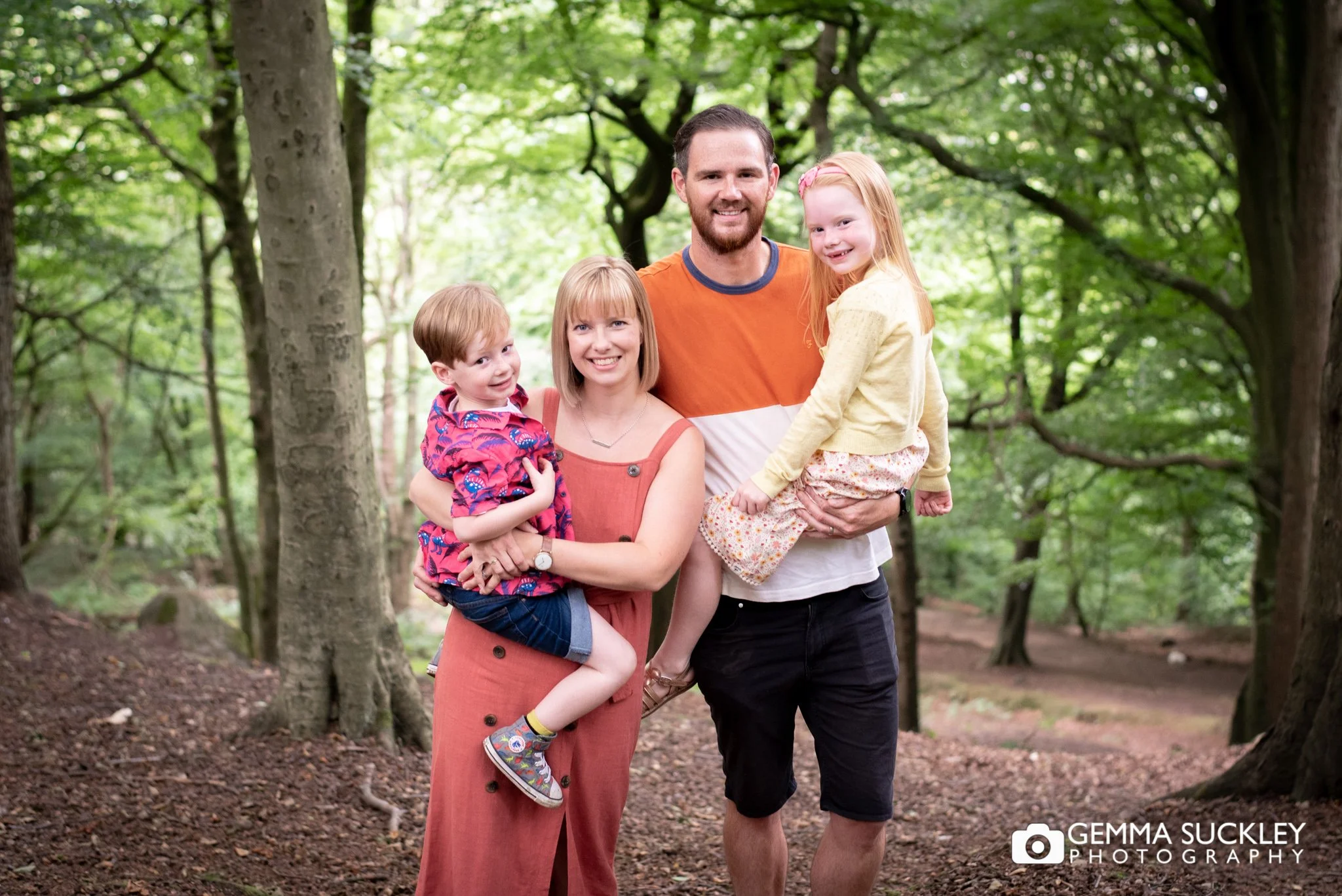 a family in summer clothes at otley country park