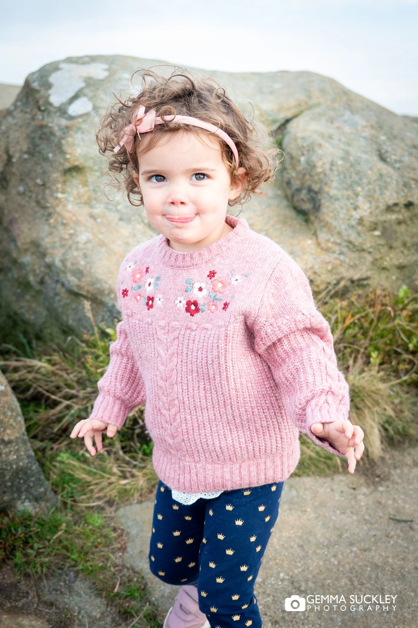 little girls exploring the rock at chevin country park