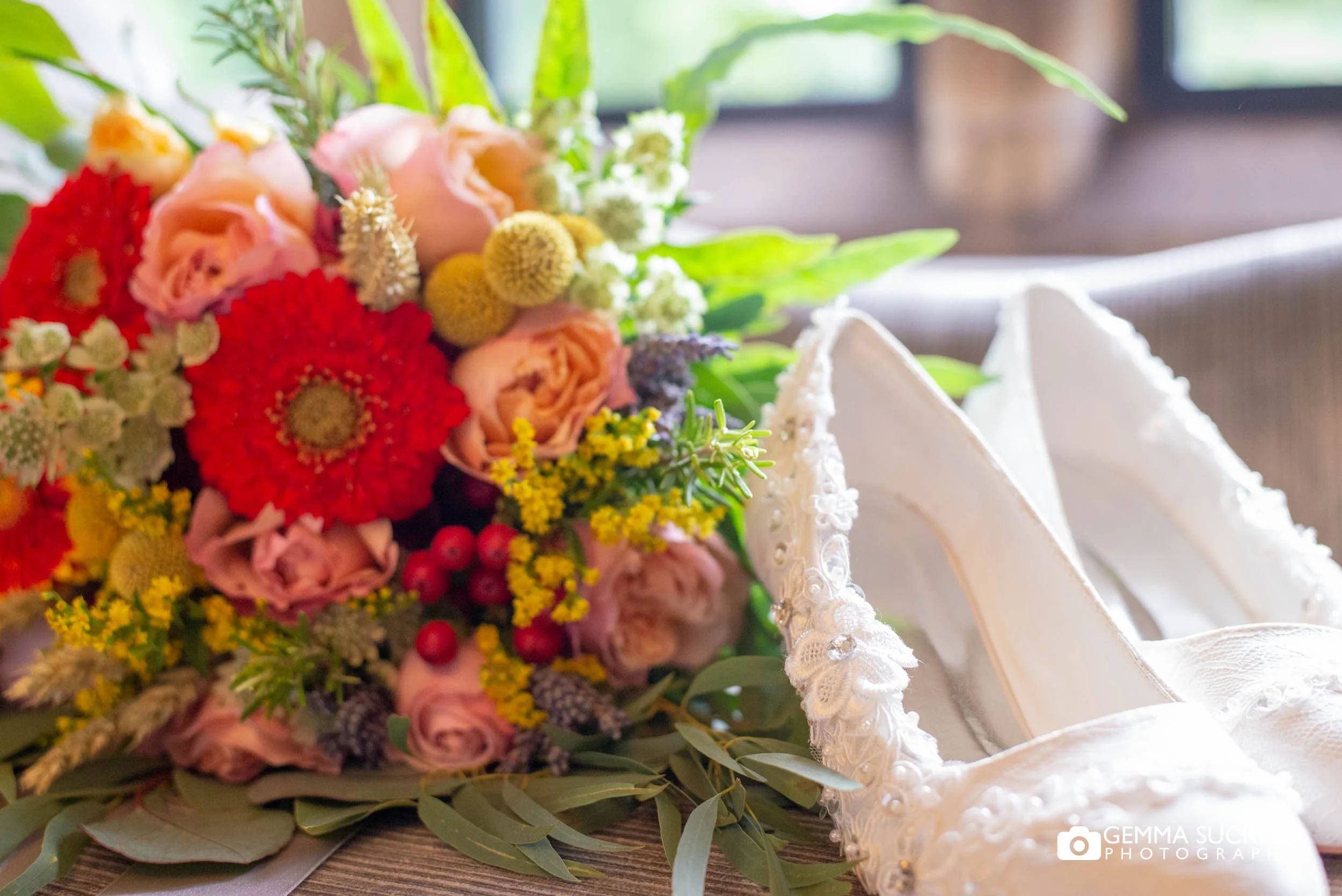 bouquet and bridal shoes