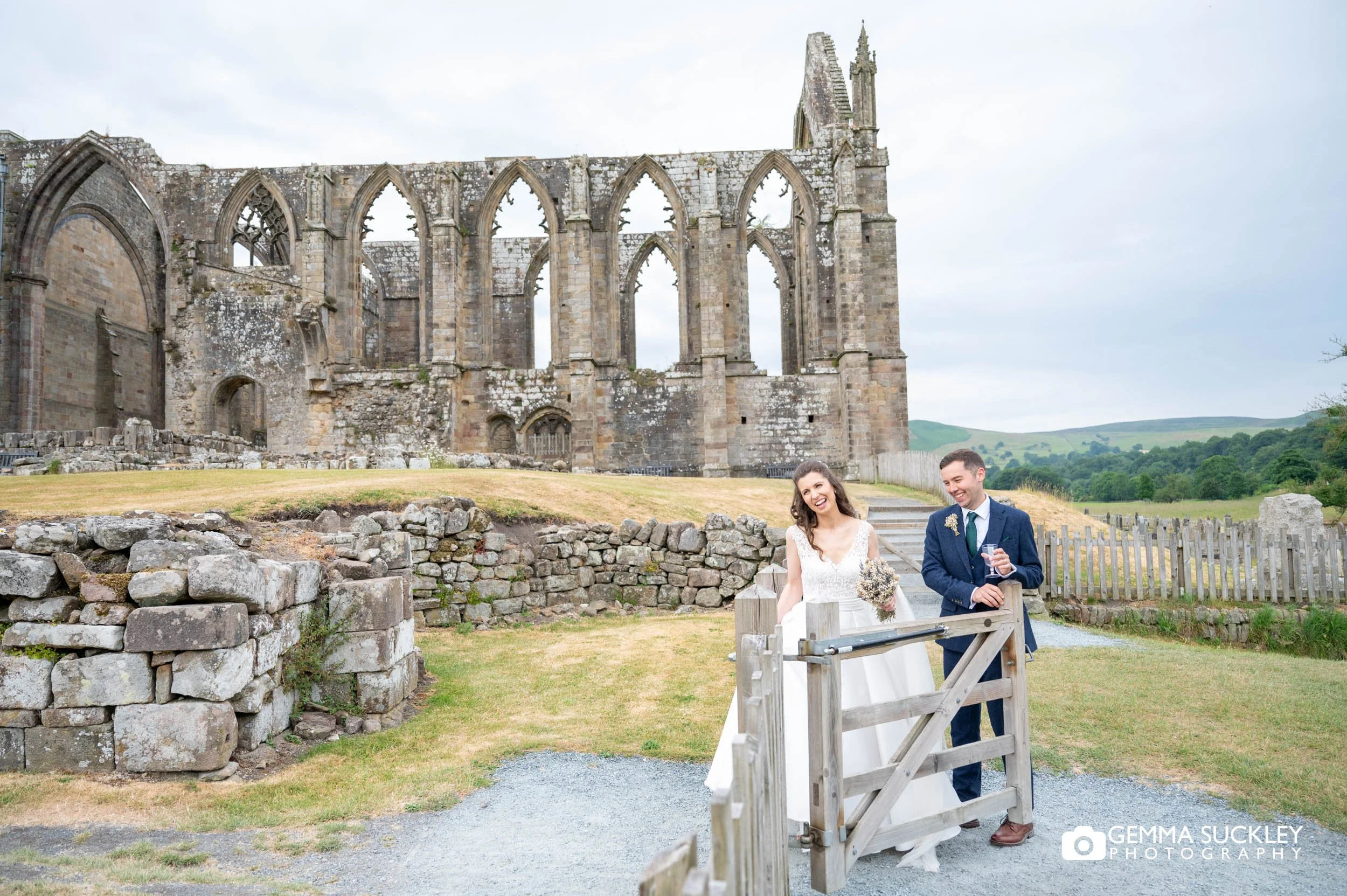 just married couple at bolton abbey priory ruins