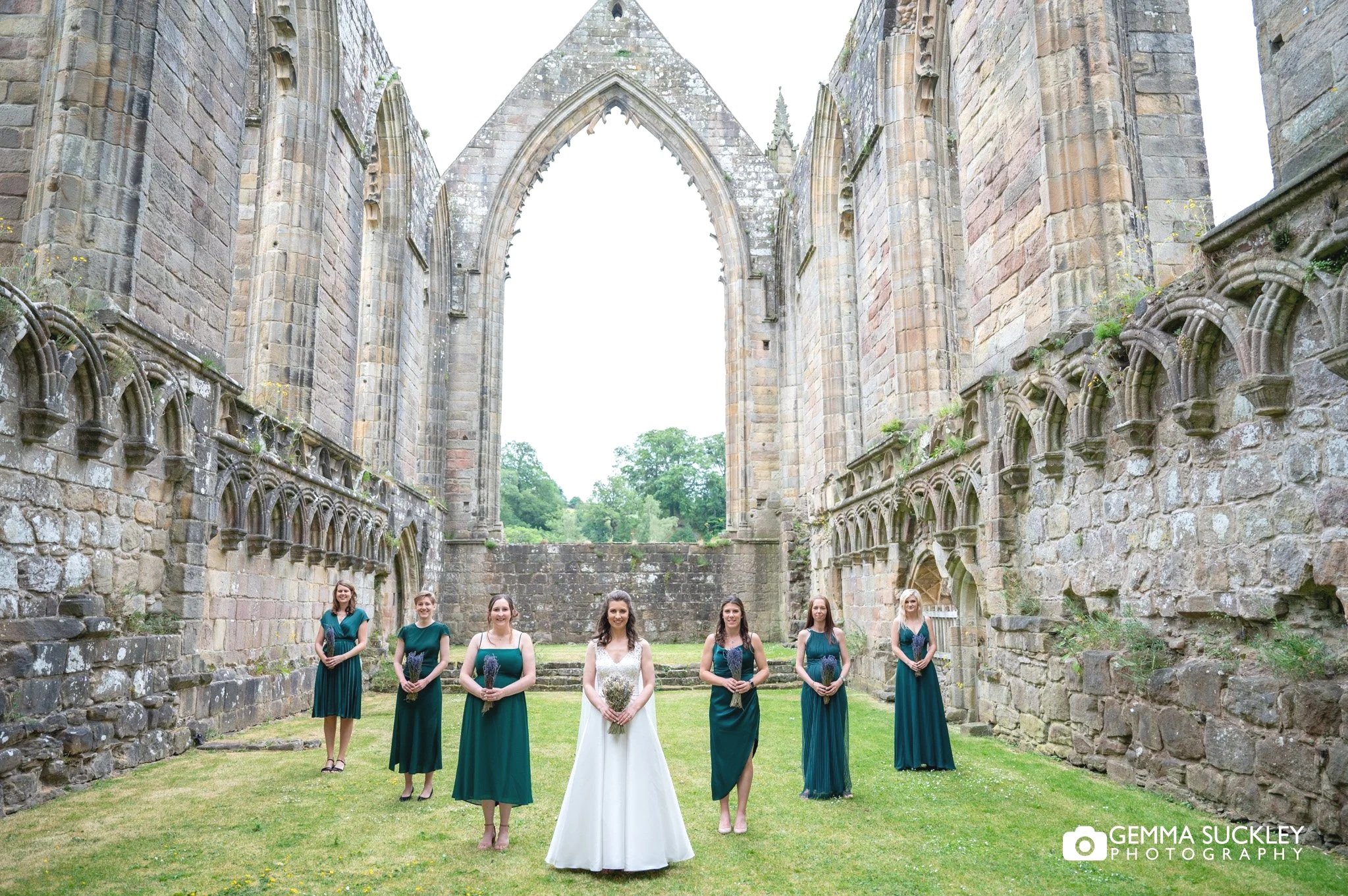 wedding party at bolton abbey priory ruins