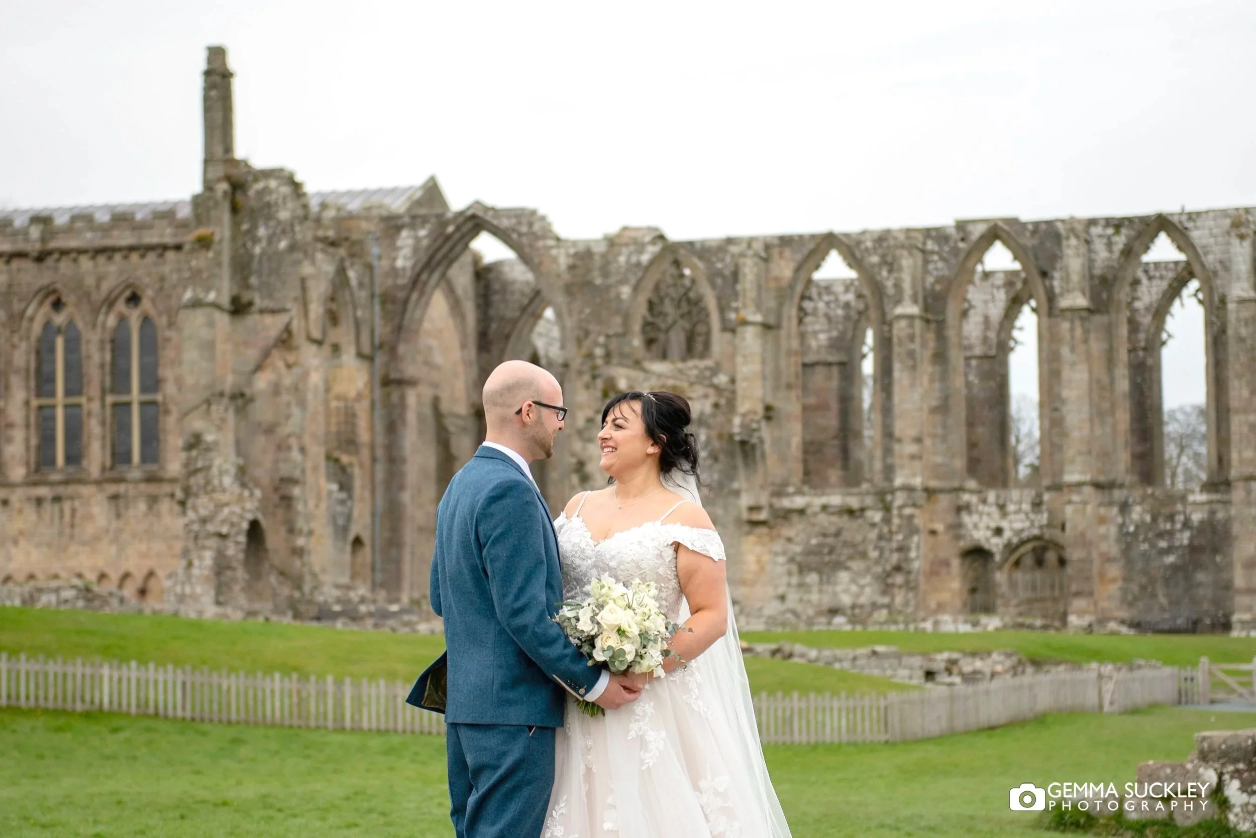 just married couple at bolton abbey priory ruins