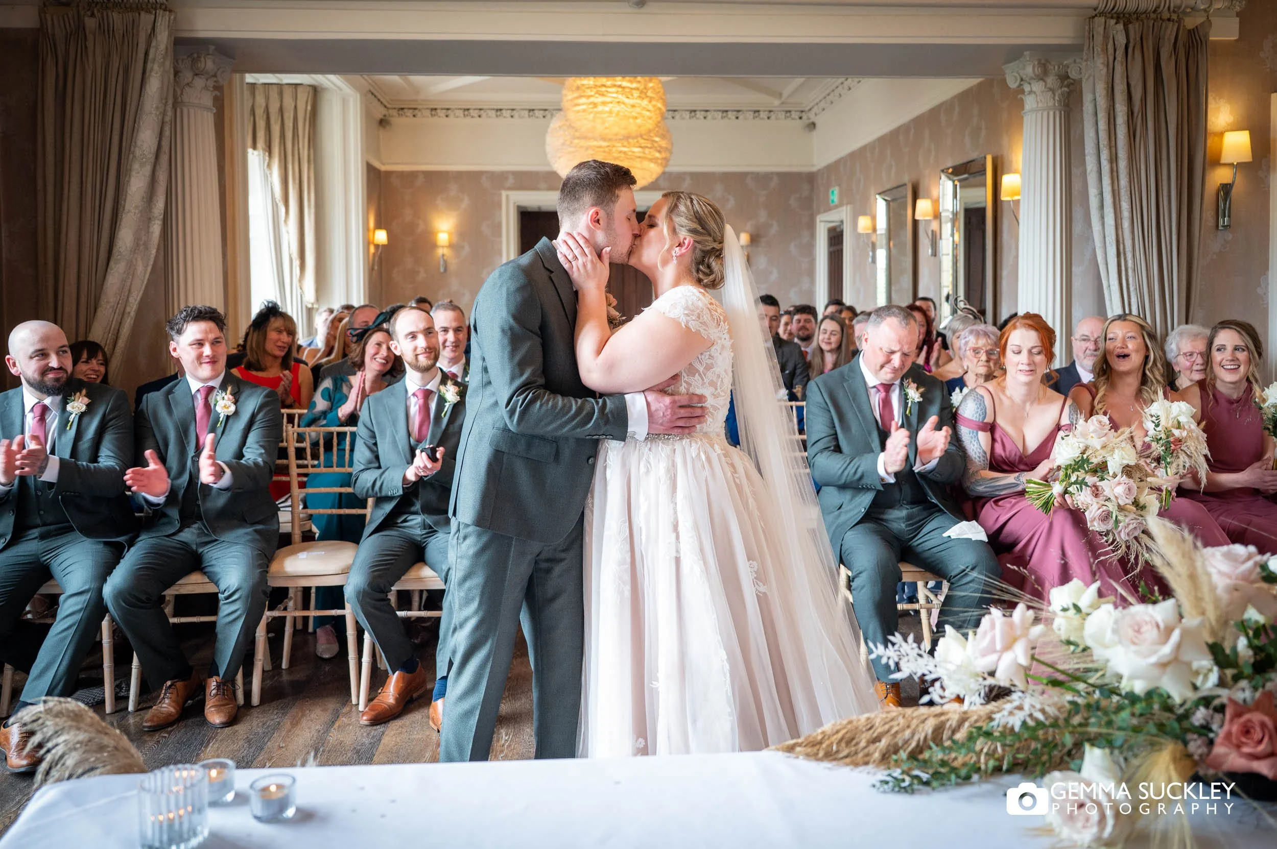 the kiss at the Falcon Manor wedding in Settle