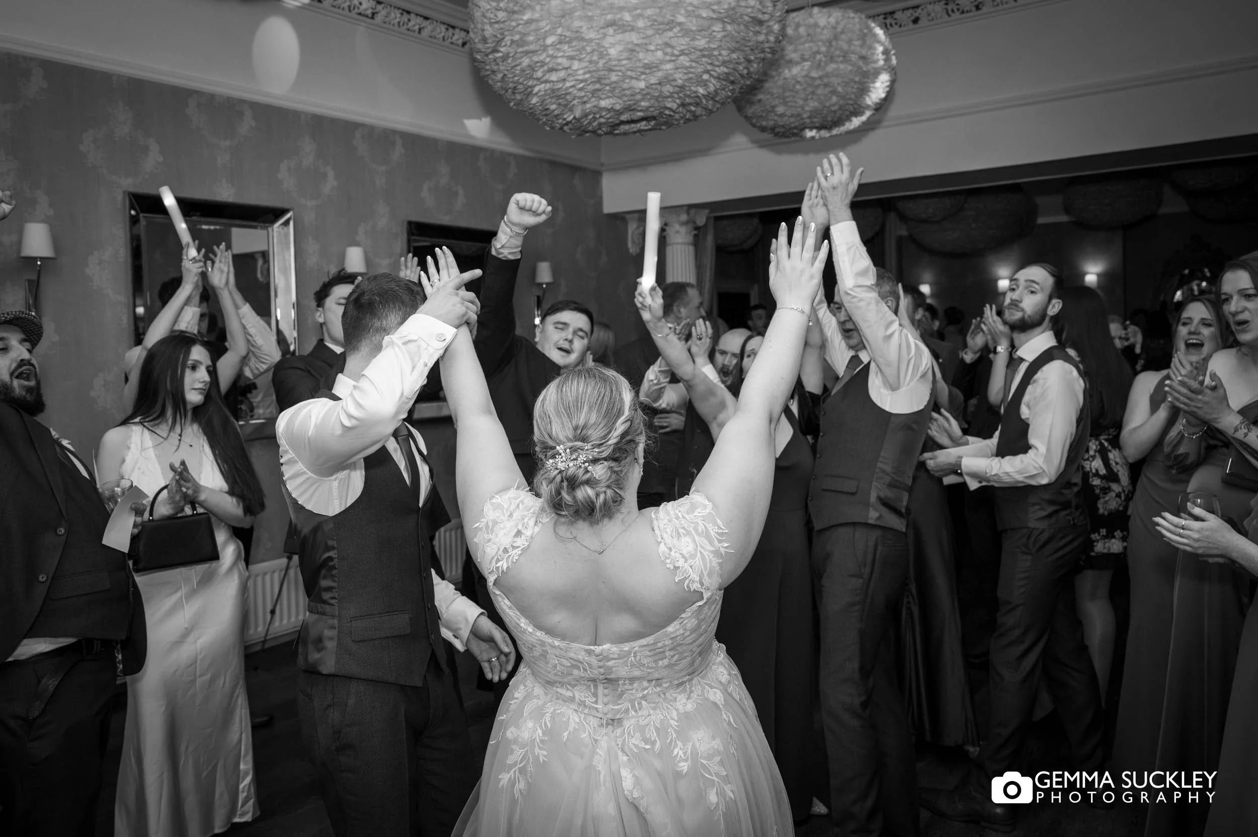 wedding party on the dancefloor at the falcon manor